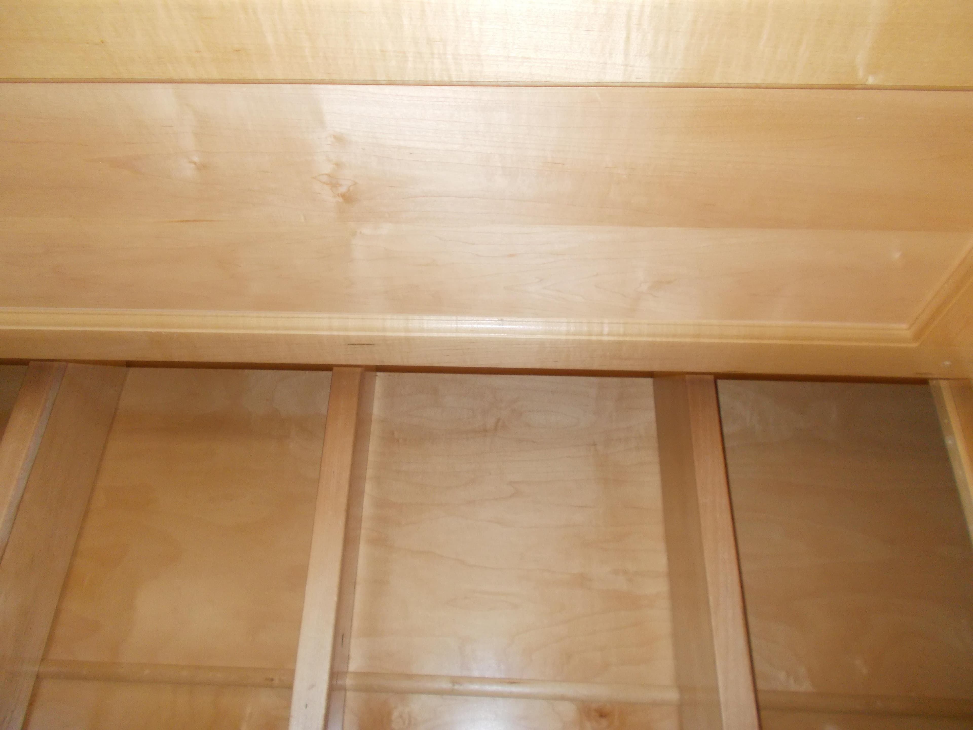 Interior wooden cabinetry of 2005 Stardust Cruisers Summer Obsession Trip 36 houseboat.