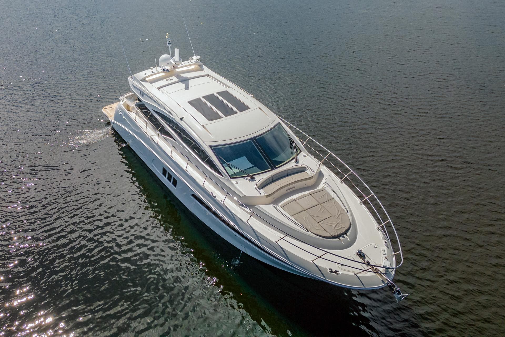 2018 Sea Ray L590 luxury yacht cruising on calm waters.