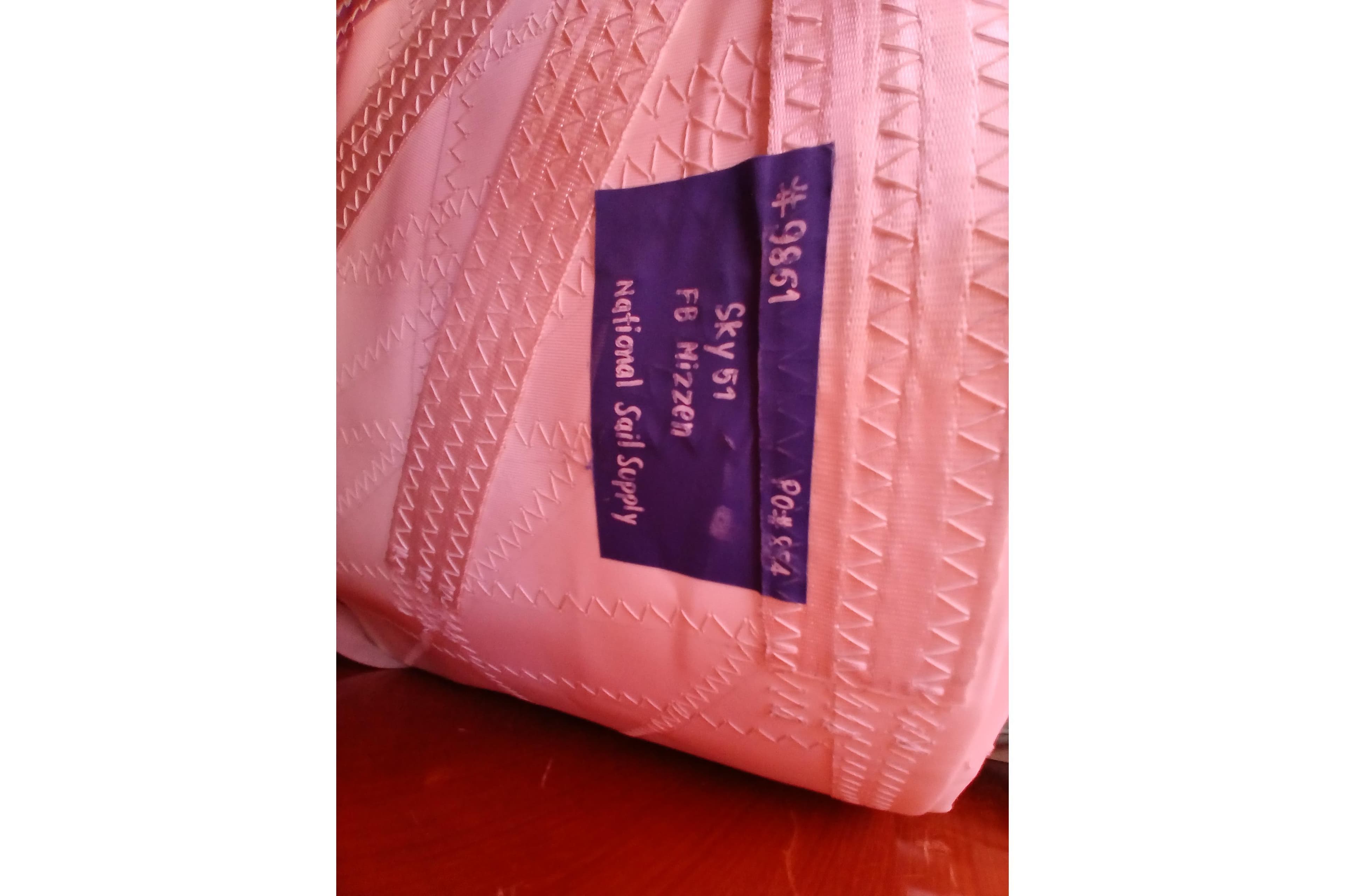Pink sail with label from National Sail Supply for Kaufman Skye 51, 1981 model.