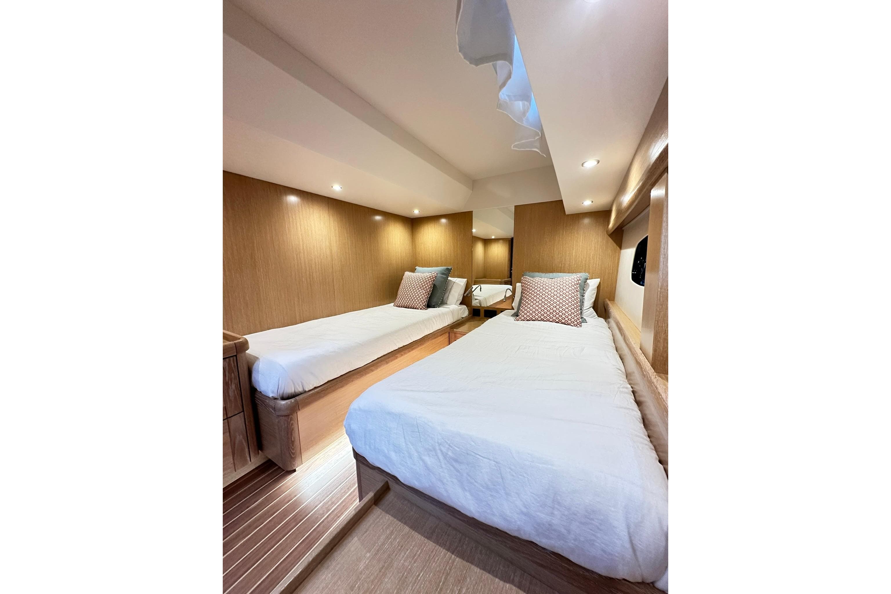 Interior of 2026 Sasga Yachts Menorquin 48FB with twin beds and modern design.
