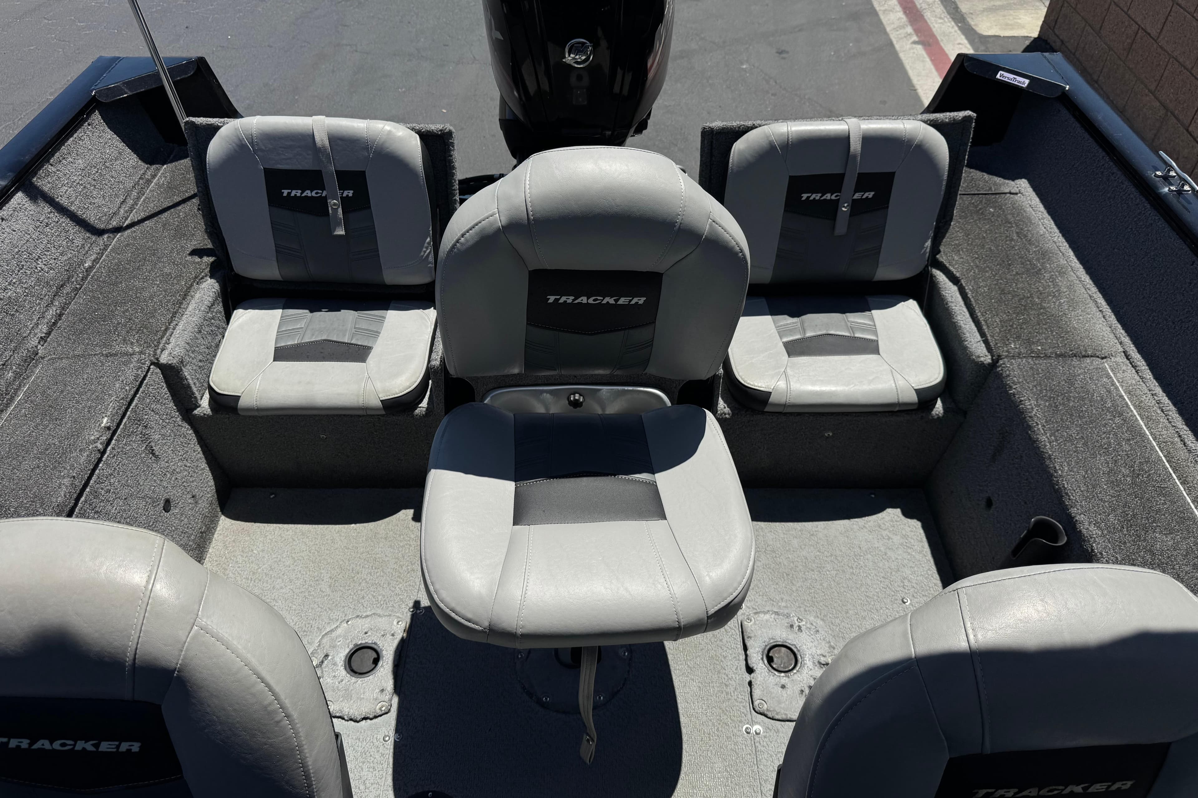 2017 Tracker Pro Guide V-175 Combo boat interior with gray seating arrangement.