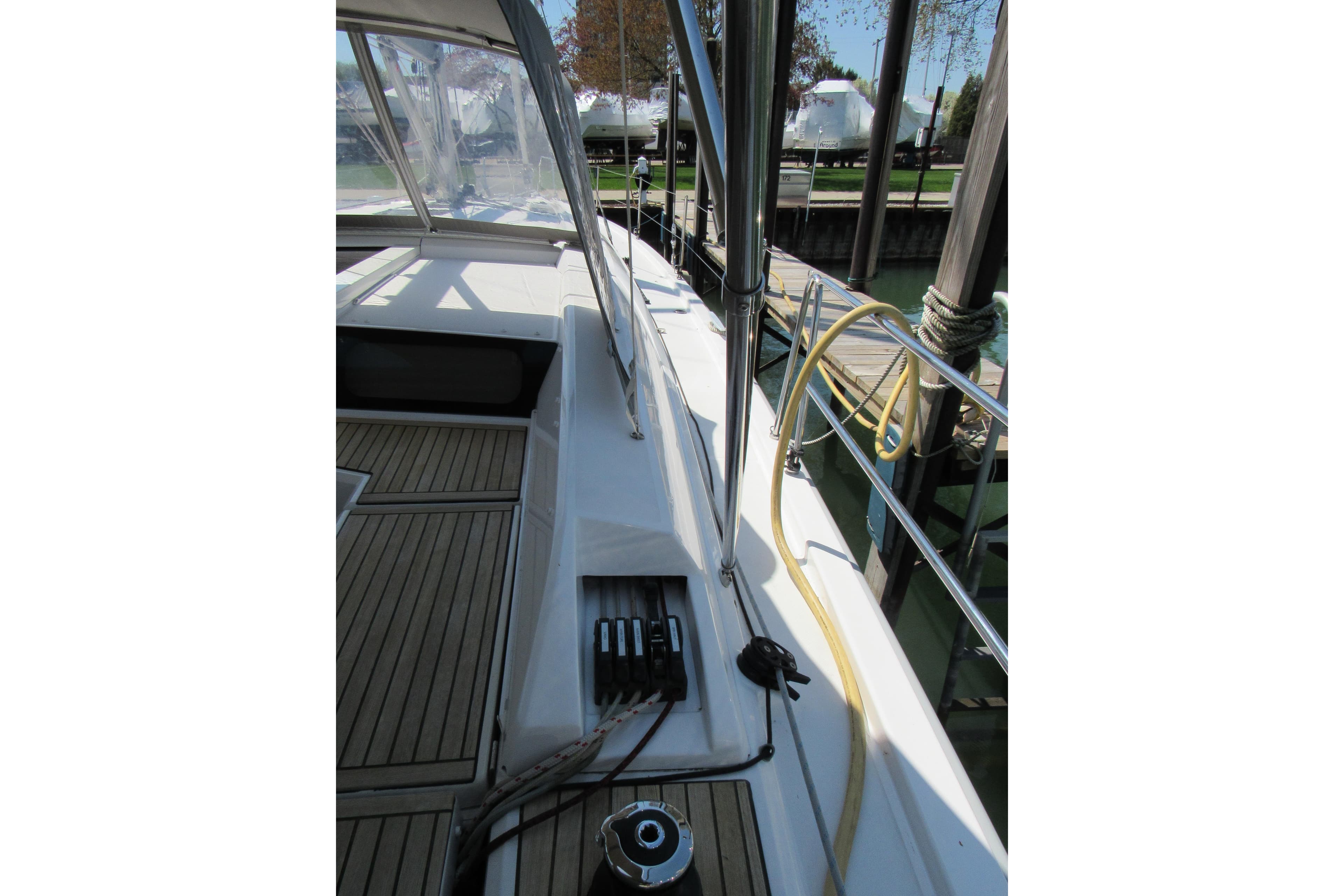 2020 Beneteau Oceanis 46.1 sailboat deck with teak flooring and rigging details.