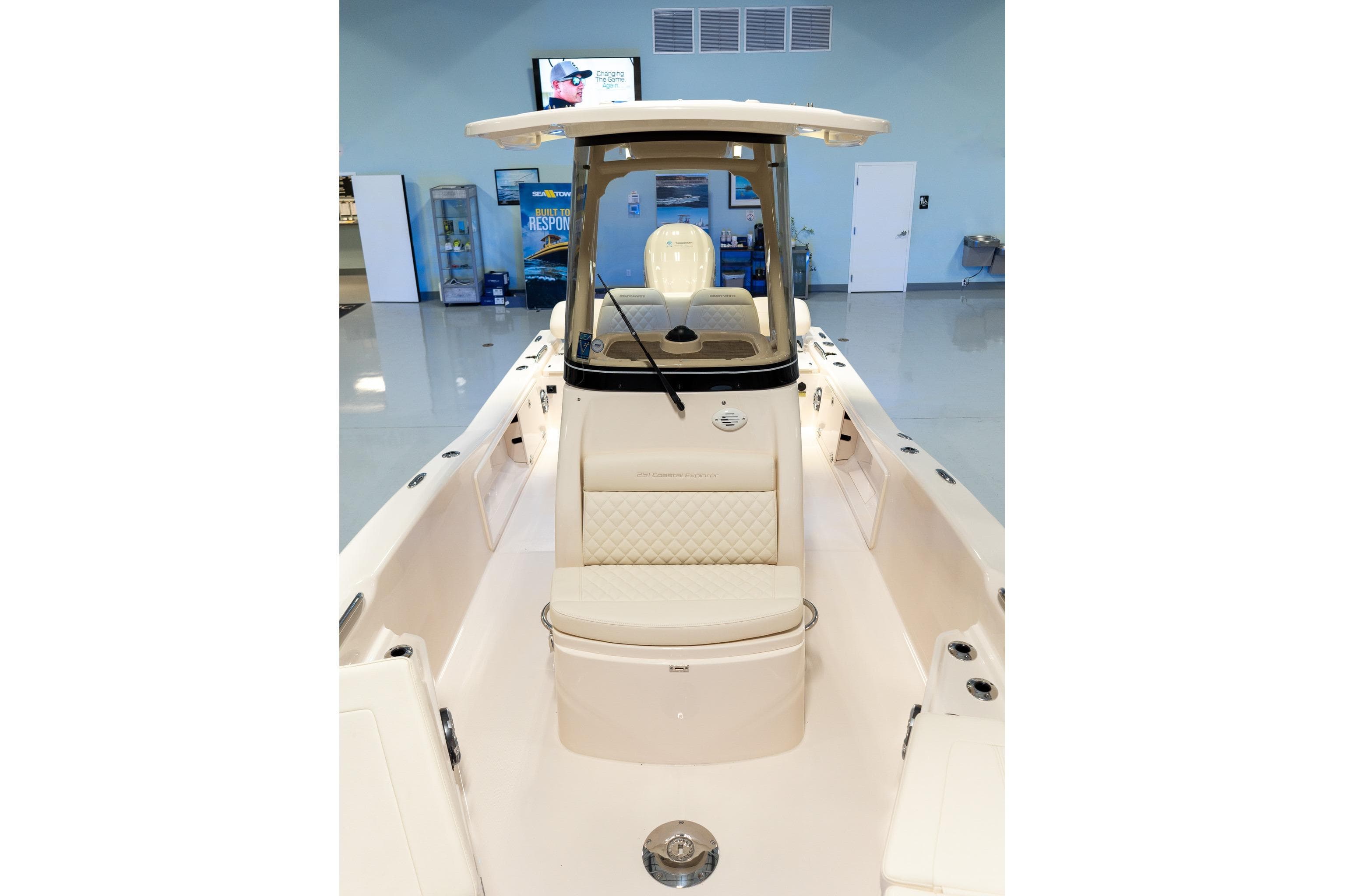 2025 Grady-White 251 Coastal Explorer boat interior with seating and console.
