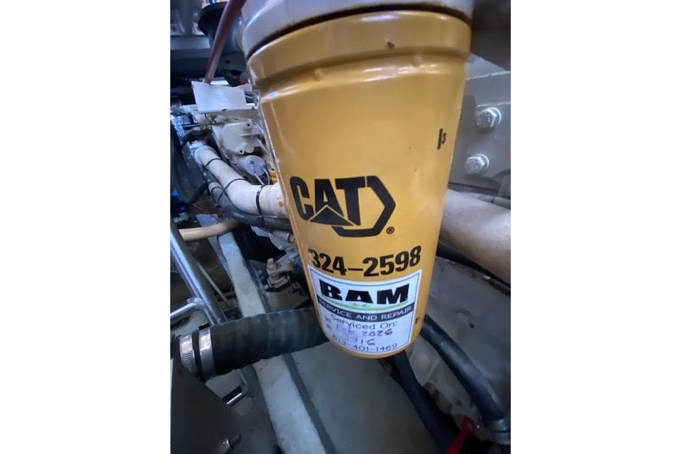 CAT engine filter in 1999 Mainship 350 Trawler engine room.