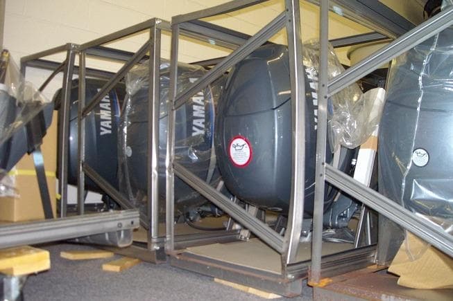 Crated Yamaha outboard motors in storage, related to 2026 SunChaser Vista 20 CRB.