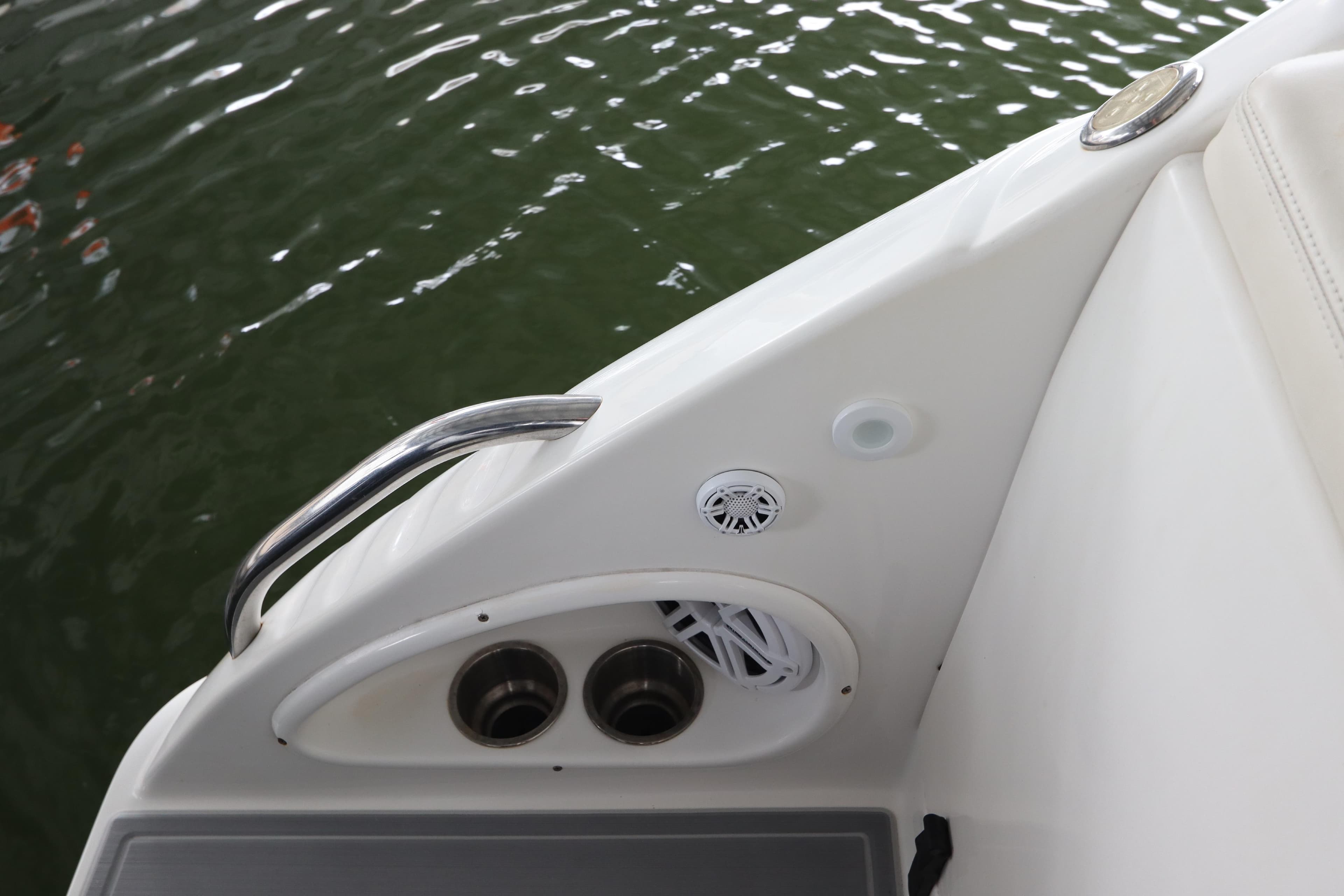 2014 Intermarine 380 Sport boat detail with water backdrop.