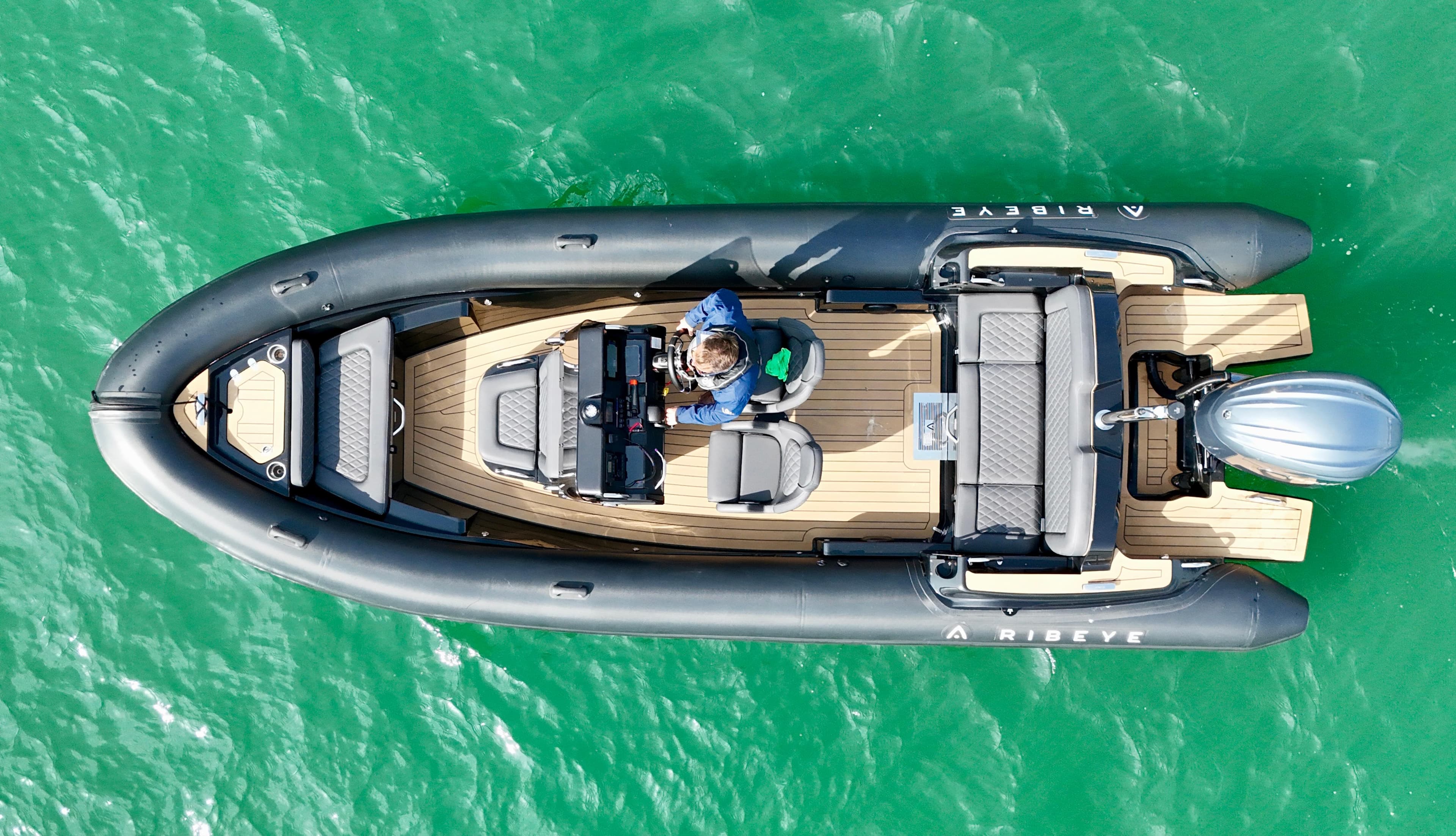 Aerial view of Ribeye A683 boat on green water, 2023 model.