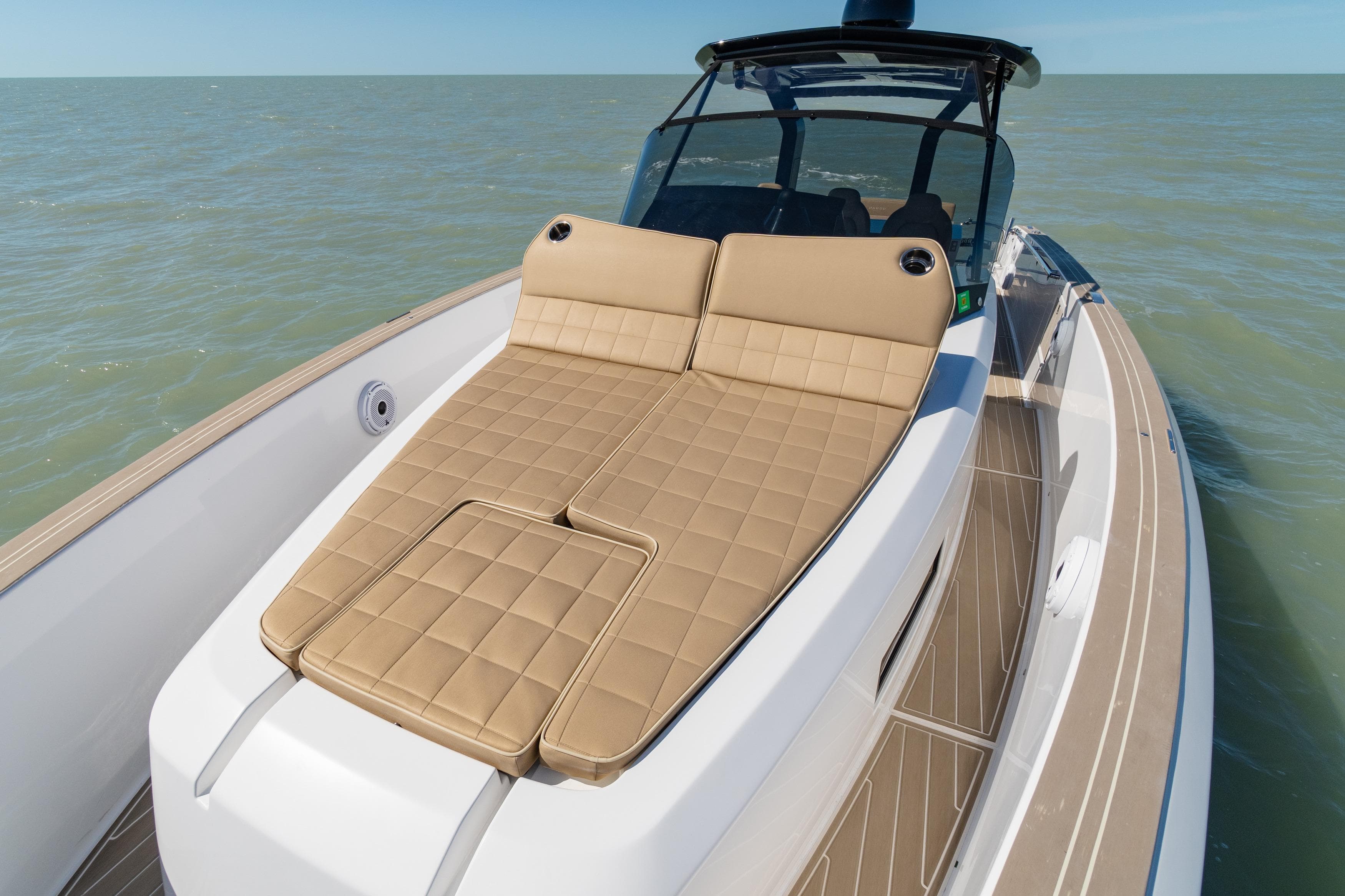 2025 Pardo Yachts P38R luxury yacht with tan sunbed on open water.