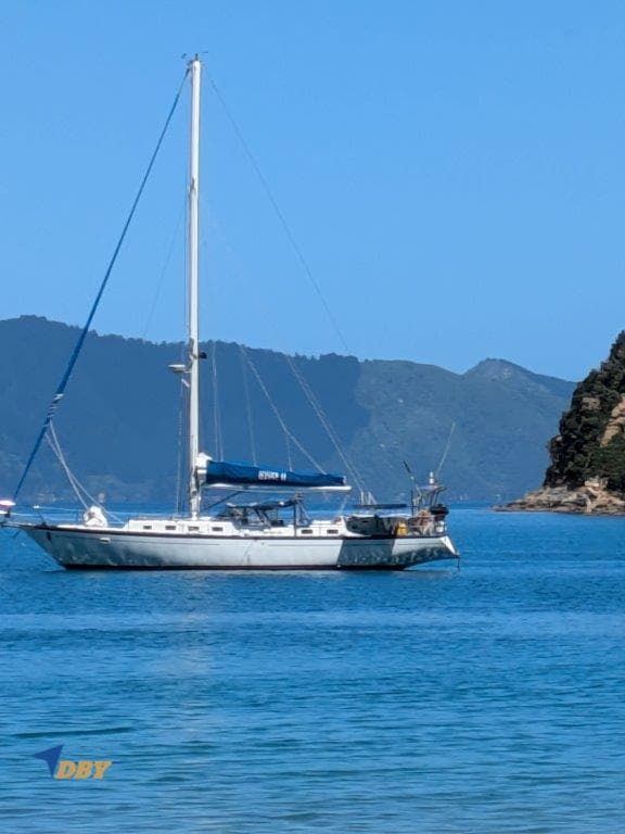 Sailboat "Spencer Yachts 53 (extended 55)" from 1979 on calm blue waters.