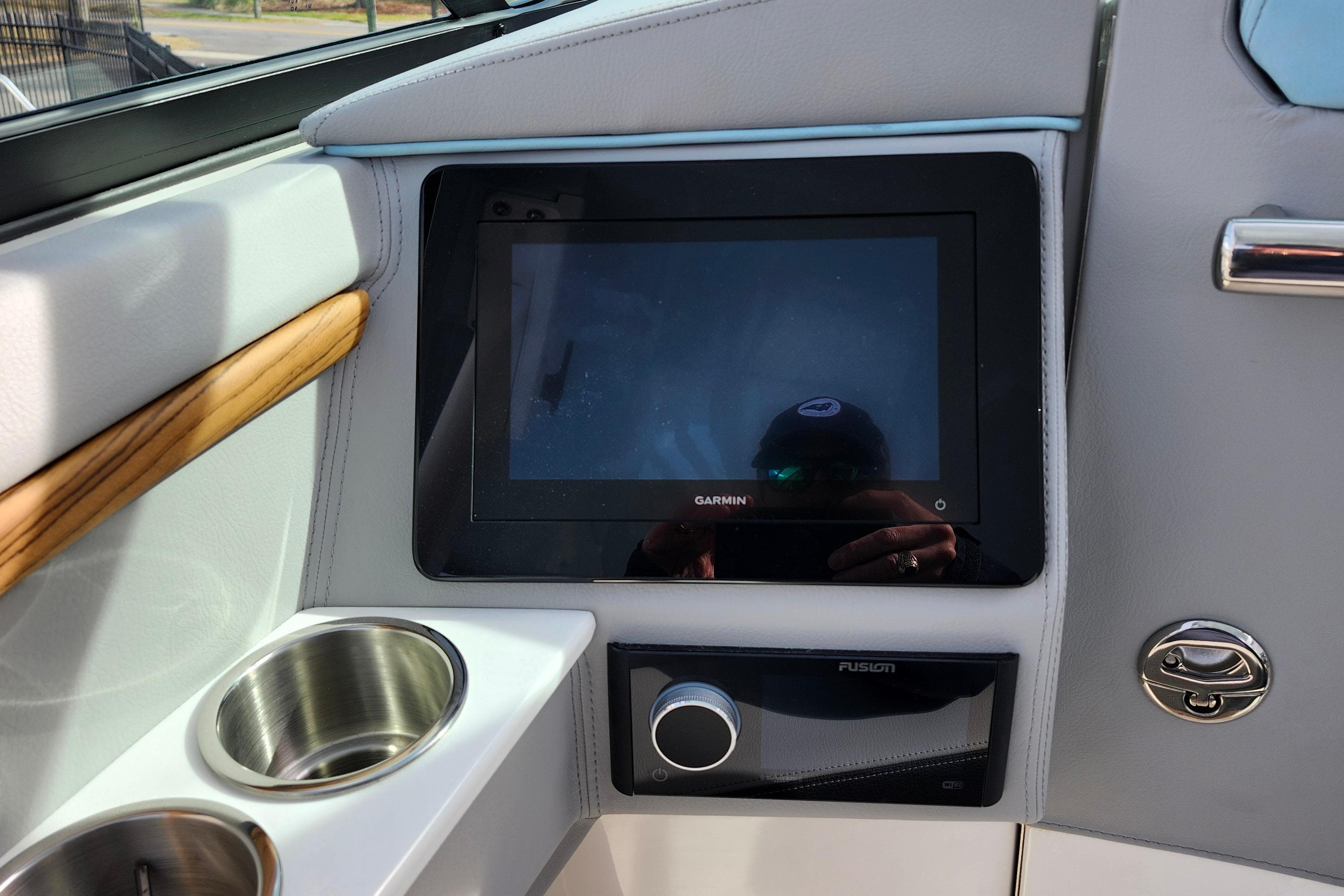 2026 Regal LX9 dashboard with Garmin display and Fusion audio system.
