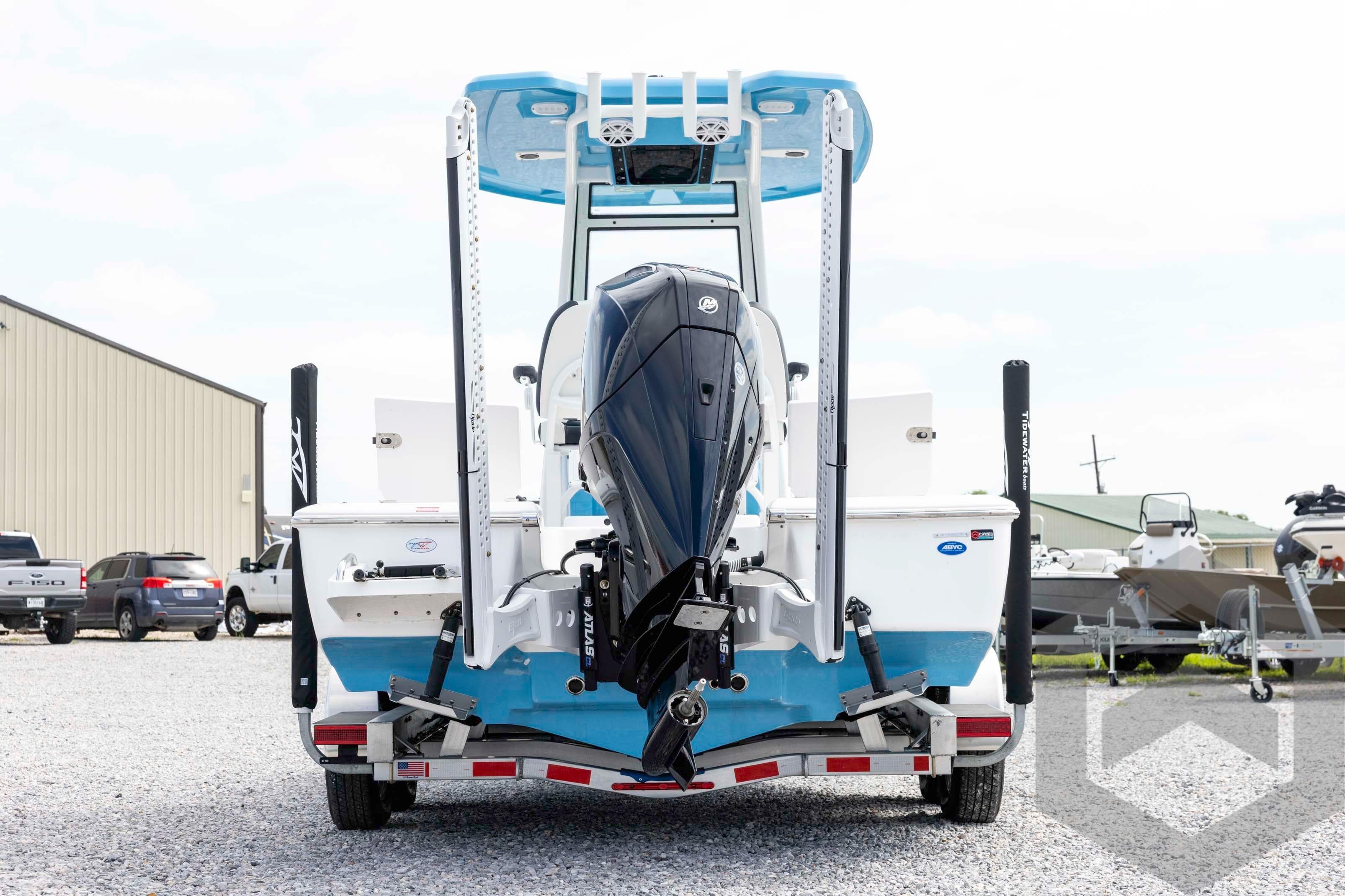 2026 Tidewater 2110 Bay Max boat on trailer, rear view with outboard motor.