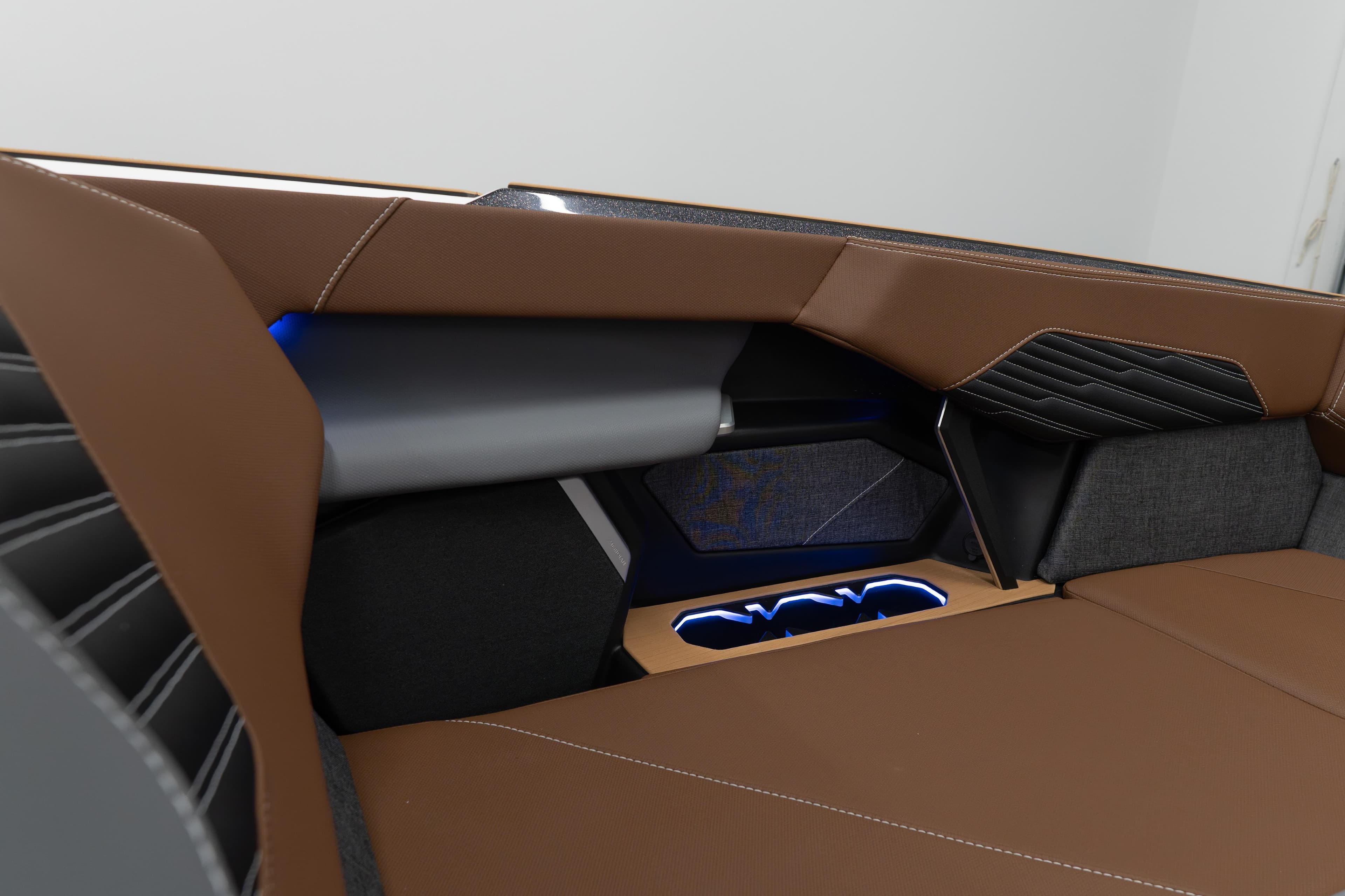 2026 MasterCraft X24 interior with brown leather seats and modern design elements.