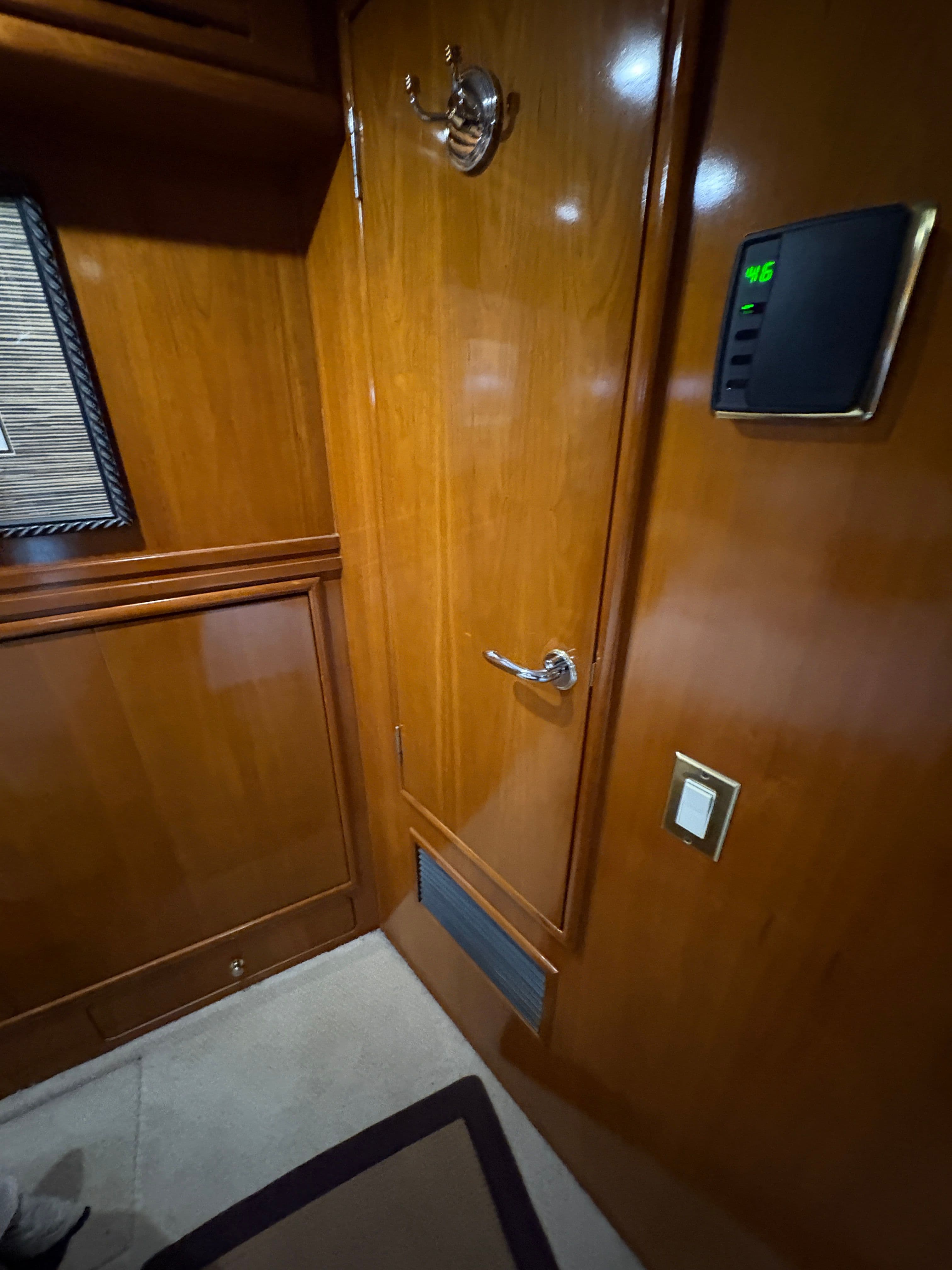 Interior of 2000 Carver 530 Voyager Pilothouse with wooden doors.