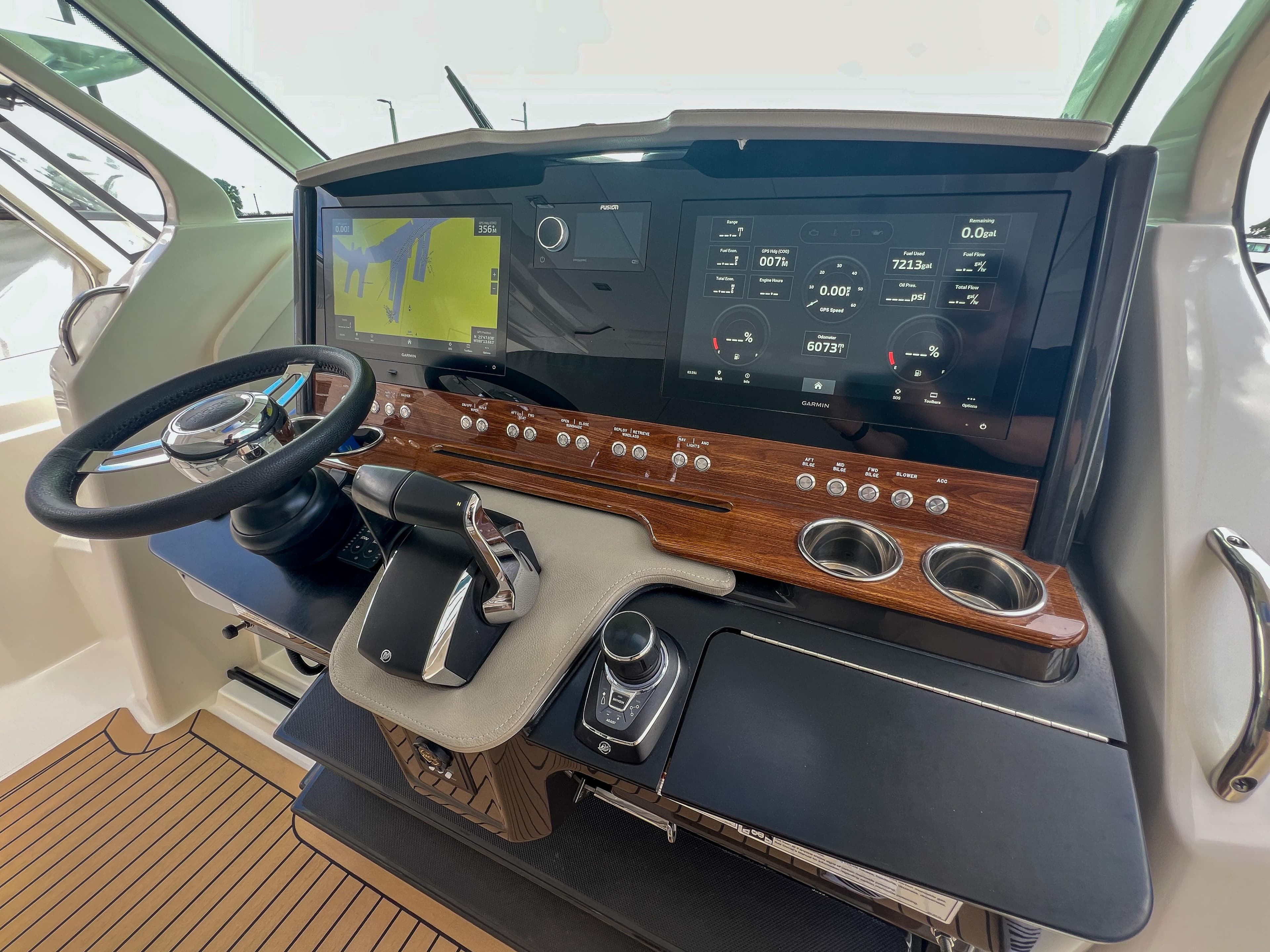 2023 Tiara Yachts 38 LS helm with advanced navigation and control systems.