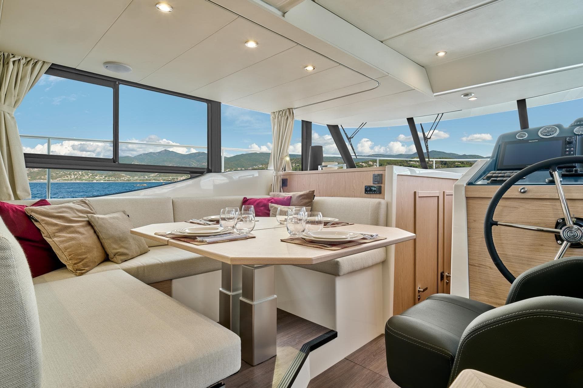 Luxurious interior of 2026 Beneteau Swift Trawler 48 with elegant dining area.