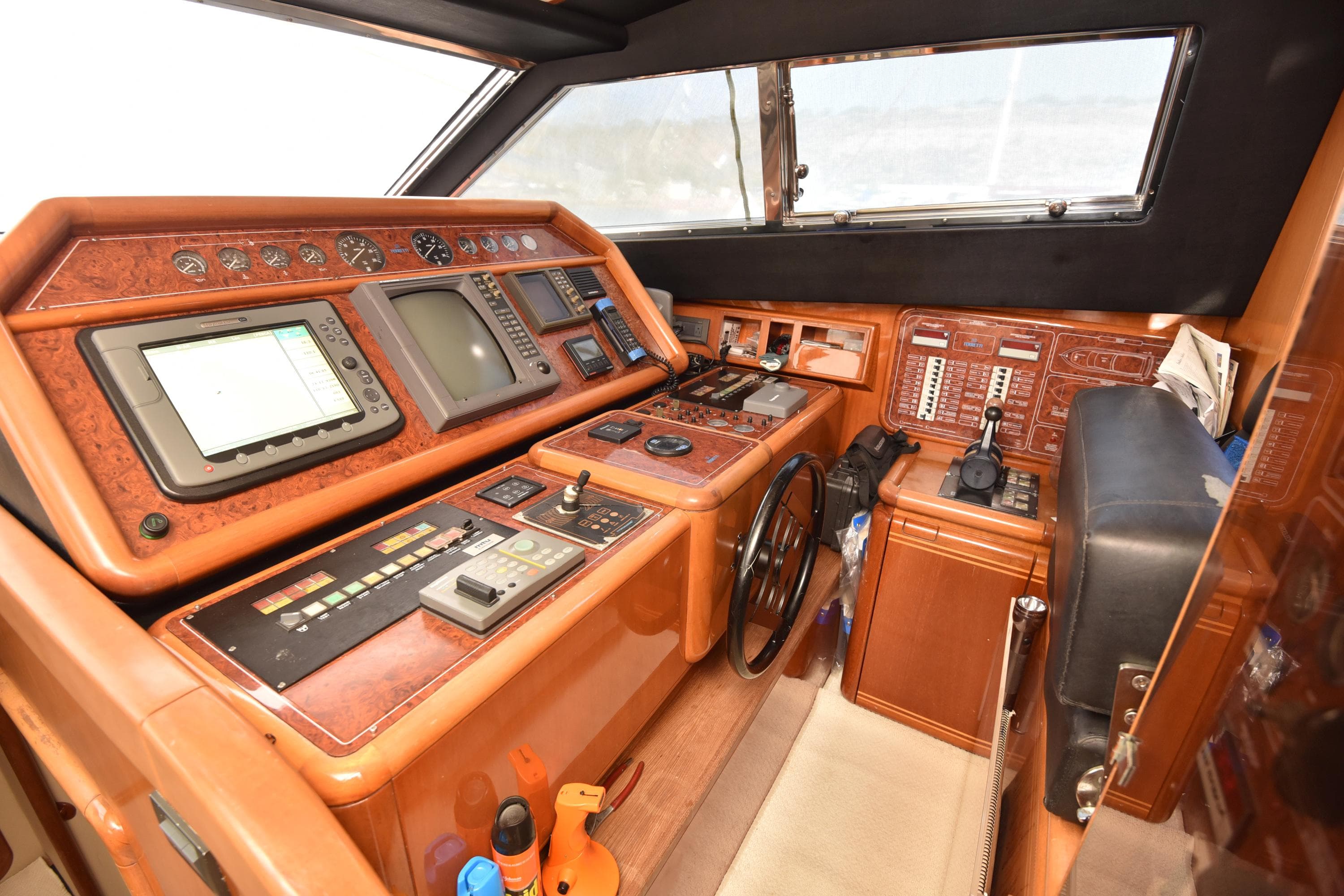 1997 Ferretti Yachts 80 helm station with navigation equipment and controls.