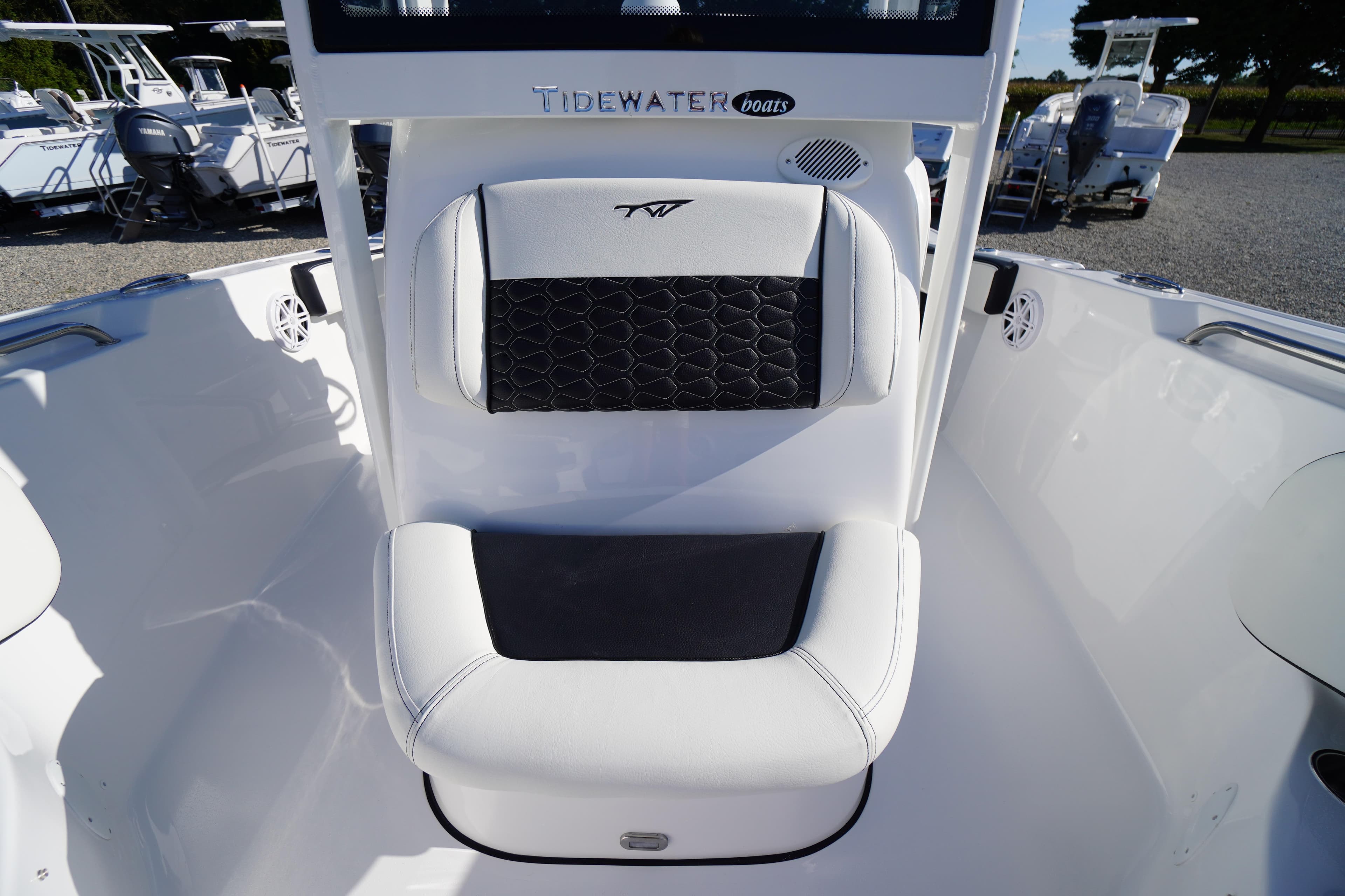2026 Tidewater 220 LXF boat interior with cushioned seating and sleek design.