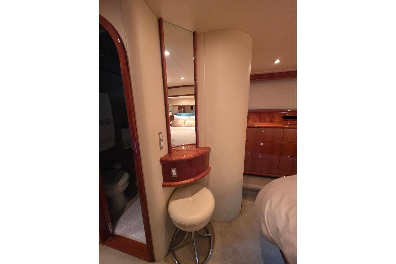 Luxurious interior of 2008 Neptunus Flybridge MY yacht with vanity and seating.
