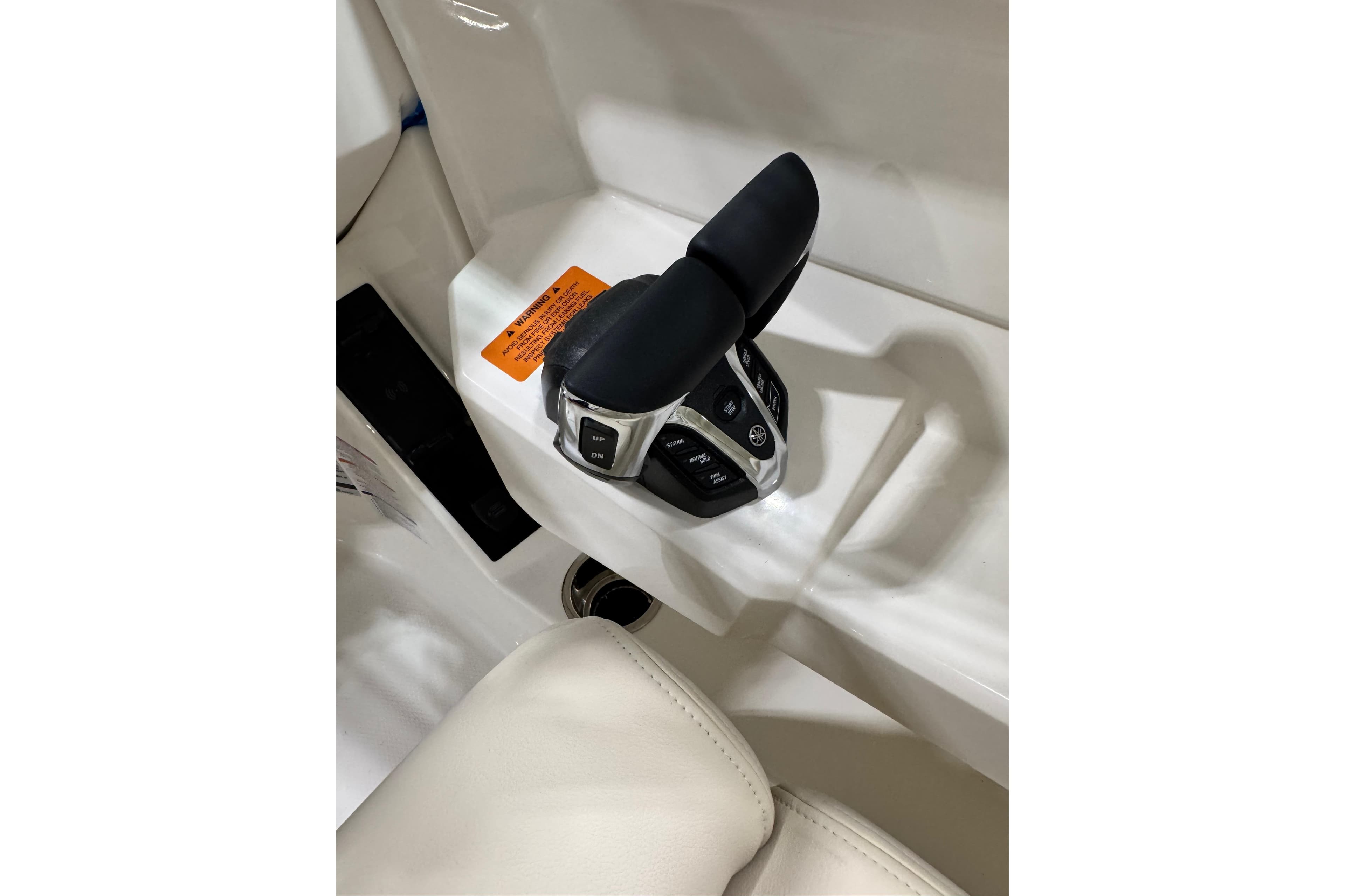 Throttle control of 2026 Robalo R257 Dual Console boat, featuring ergonomic design.