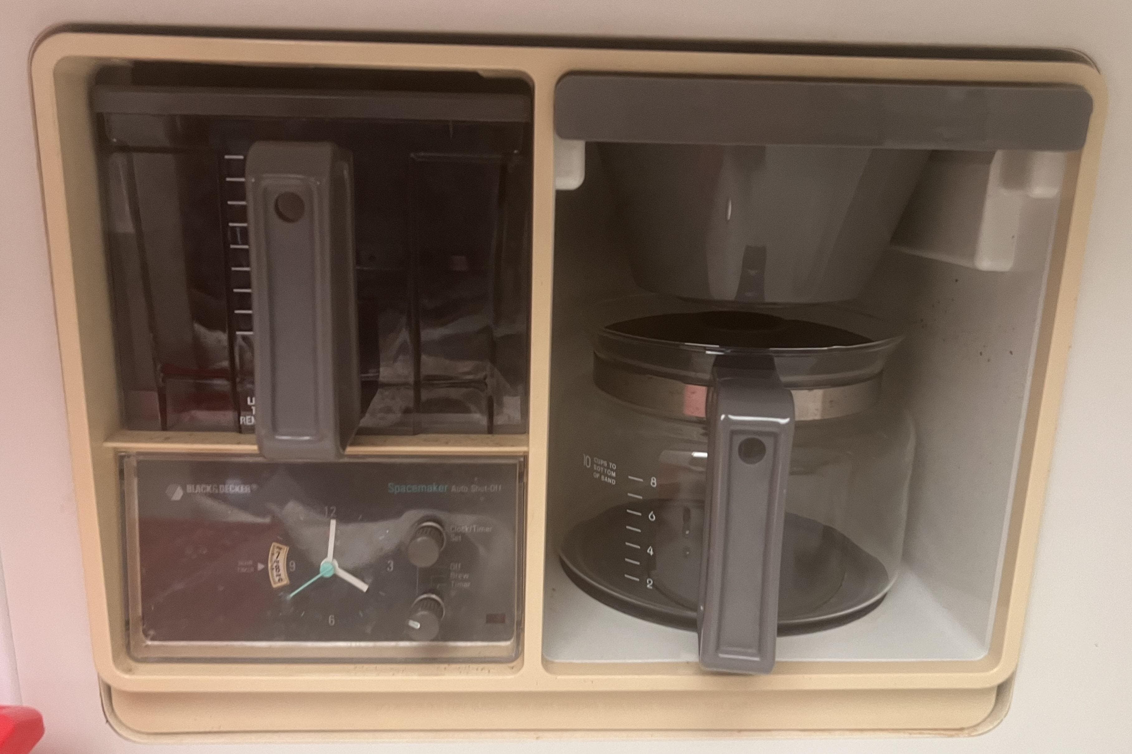 Built-in Black & Decker coffee maker on a 1994 Carver 350 yacht.