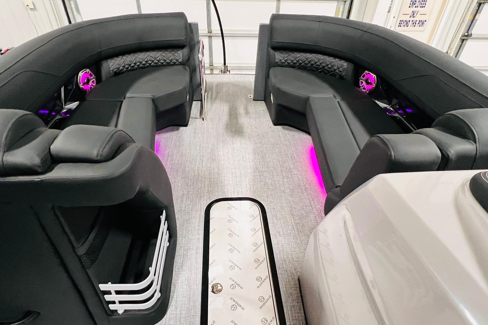 Luxurious interior of 2026 Harris Grand Mariner 230 with plush seating and ambient lighting.