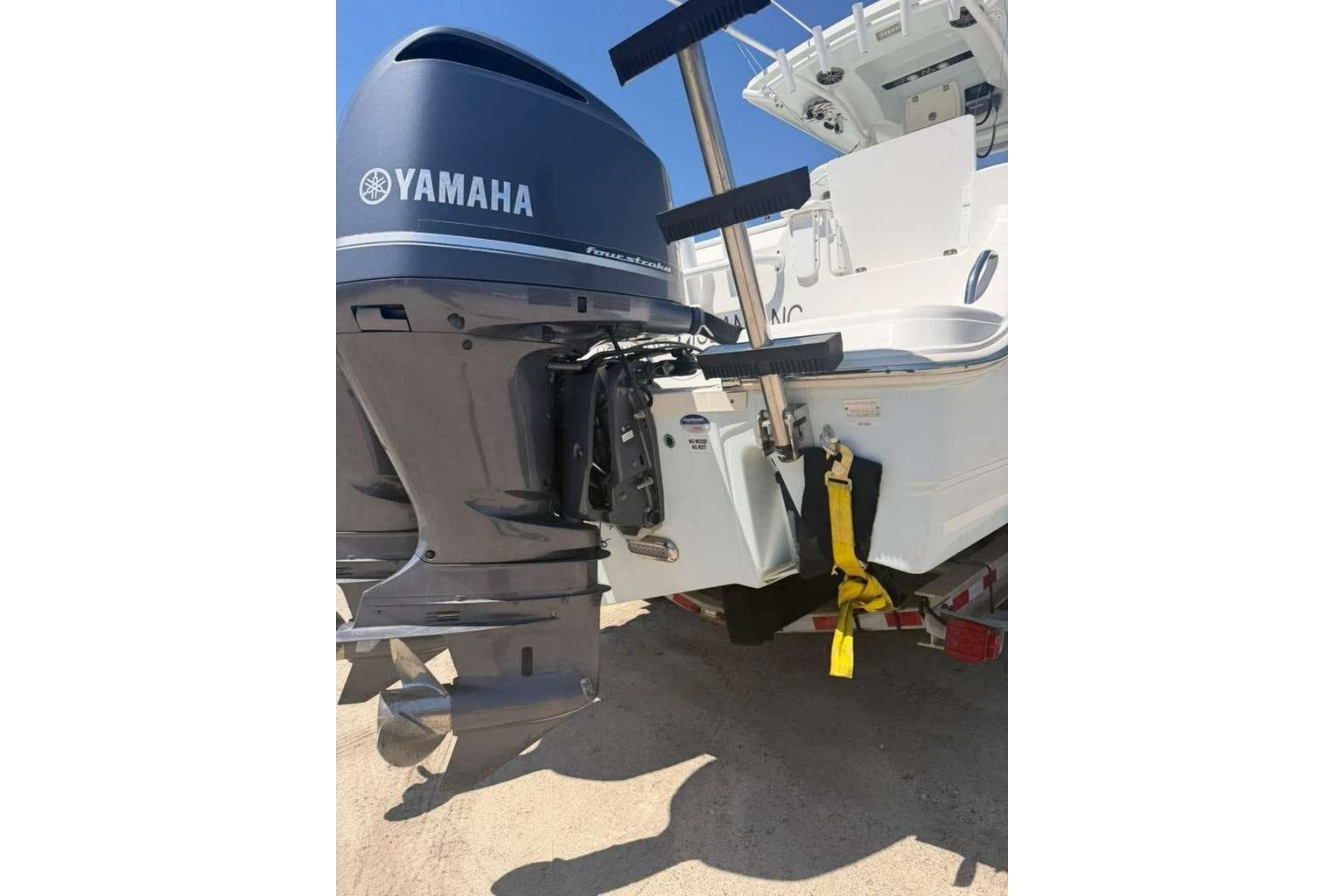 2015 Sea Fox 286 Commander with Yamaha outboard motor, parked on a trailer.