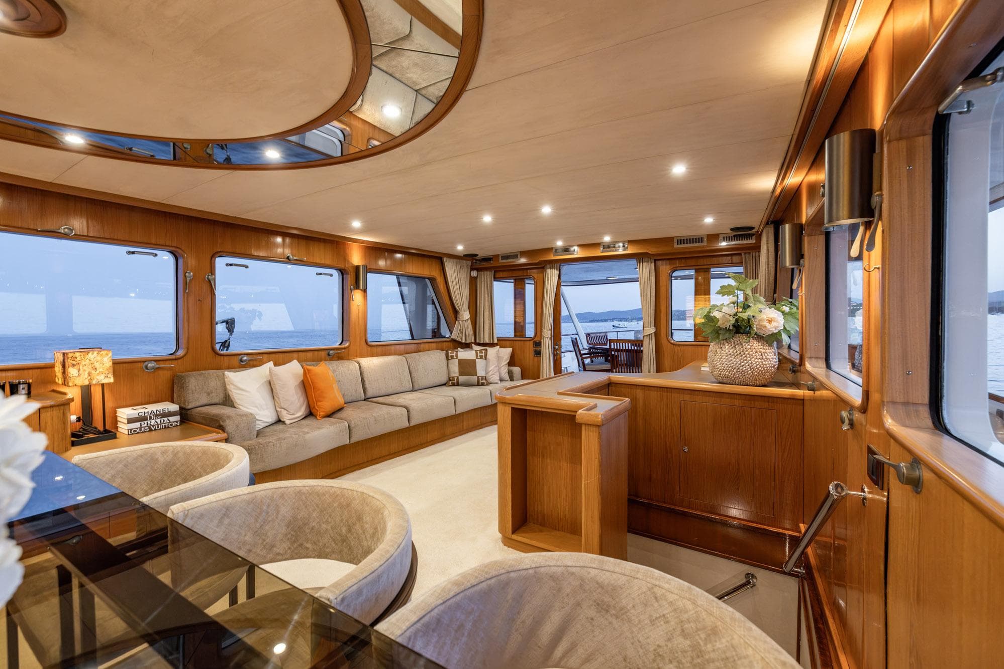 Luxurious interior of 1963 Feadship Classic Canoe Stern yacht with elegant wood finishes.