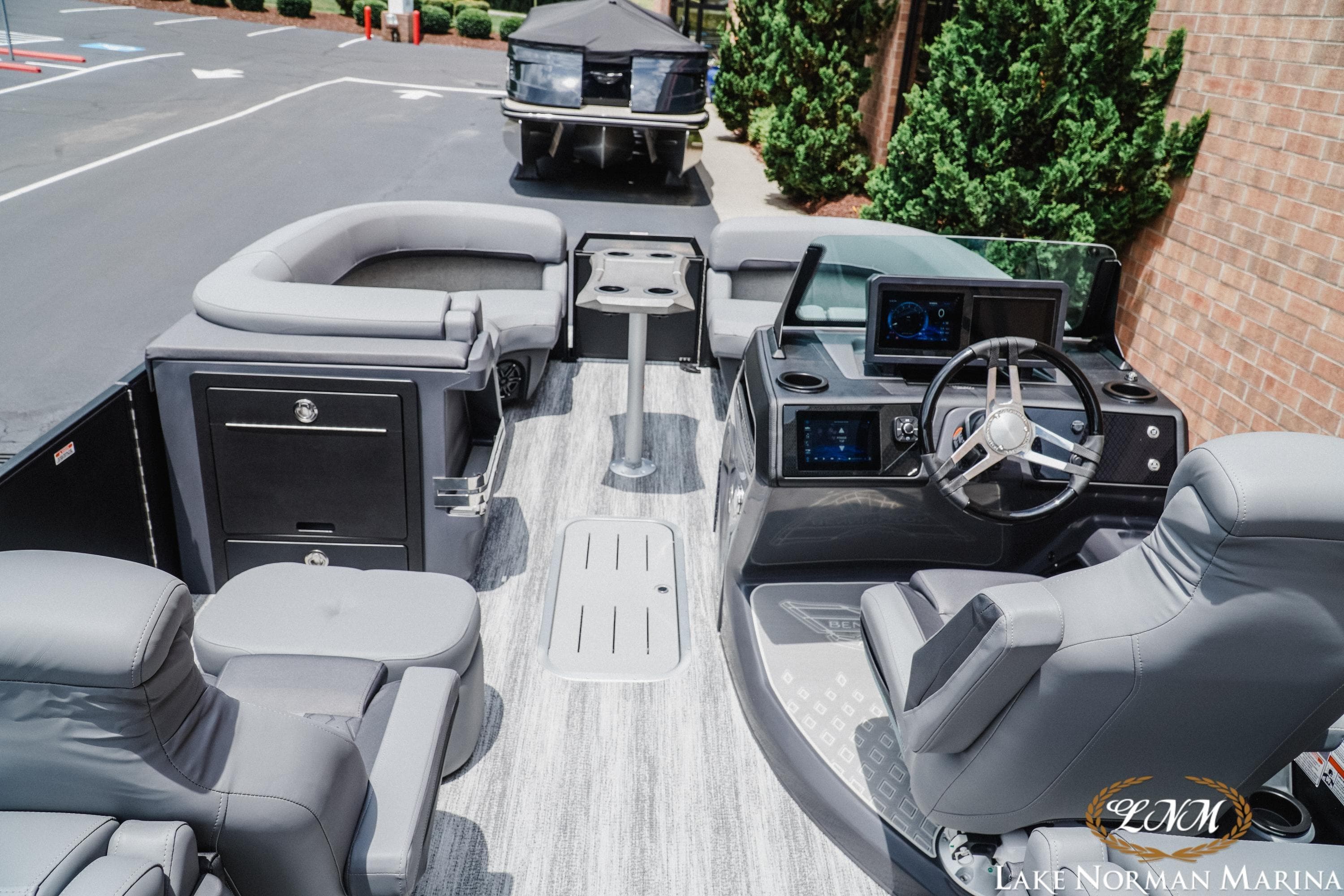 2026 Bennington 23MFB pontoon boat interior with modern helm and seating at Lake Norman Marina.