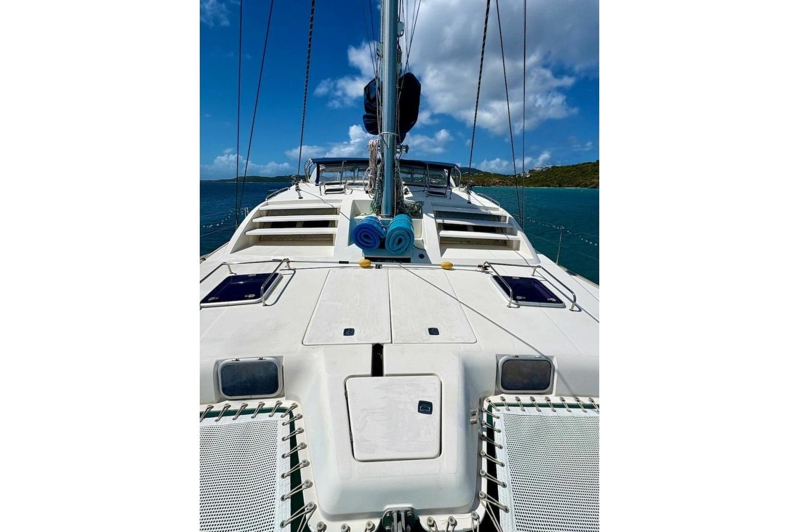 2001 Leopard 38 catamaran deck with clear skies and ocean view.