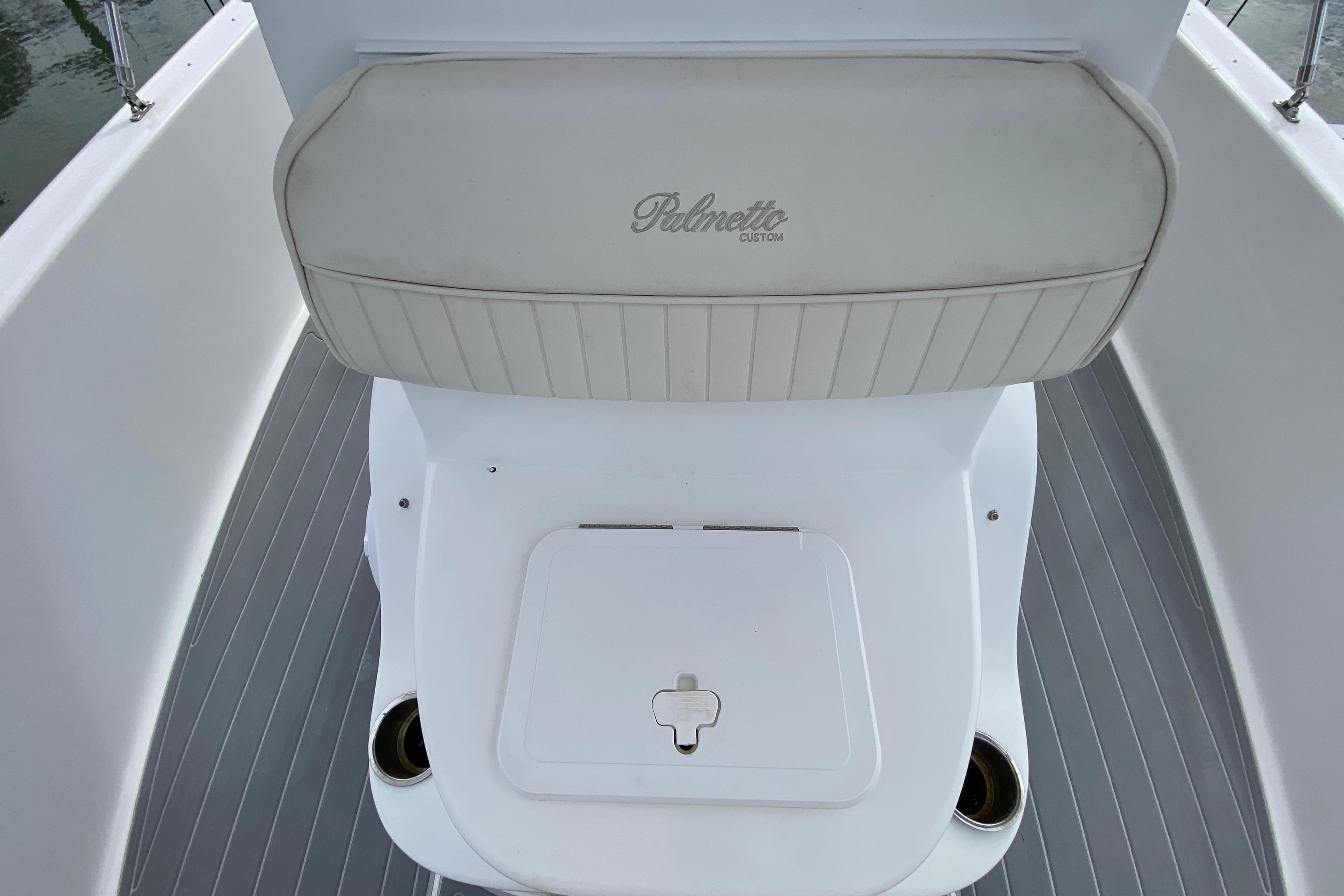 2004 Palmetto 22 Excursion boat seat and storage compartment.
