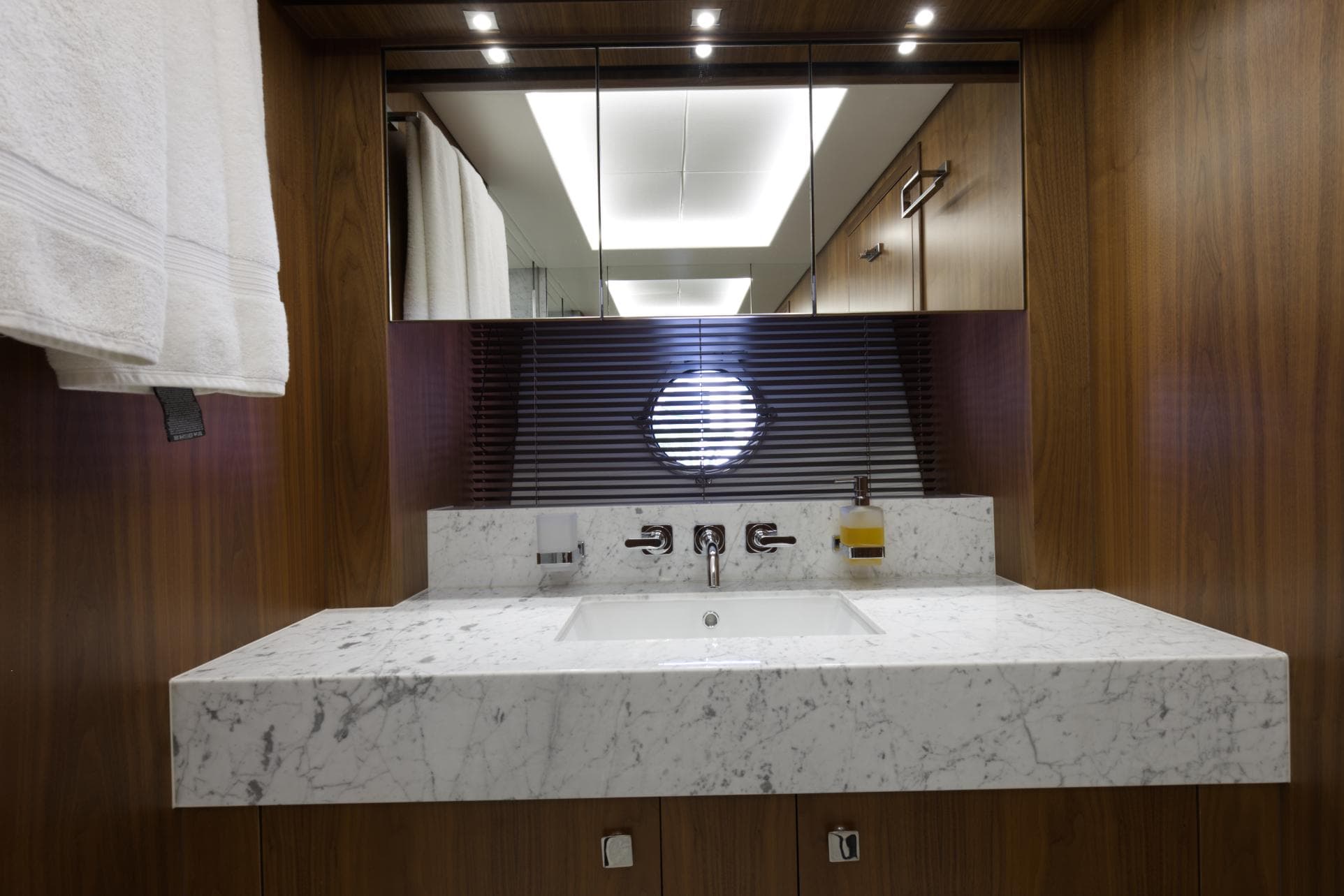 Luxurious bathroom in 2018 Sunseeker 86 Yacht with marble countertop and modern fixtures.