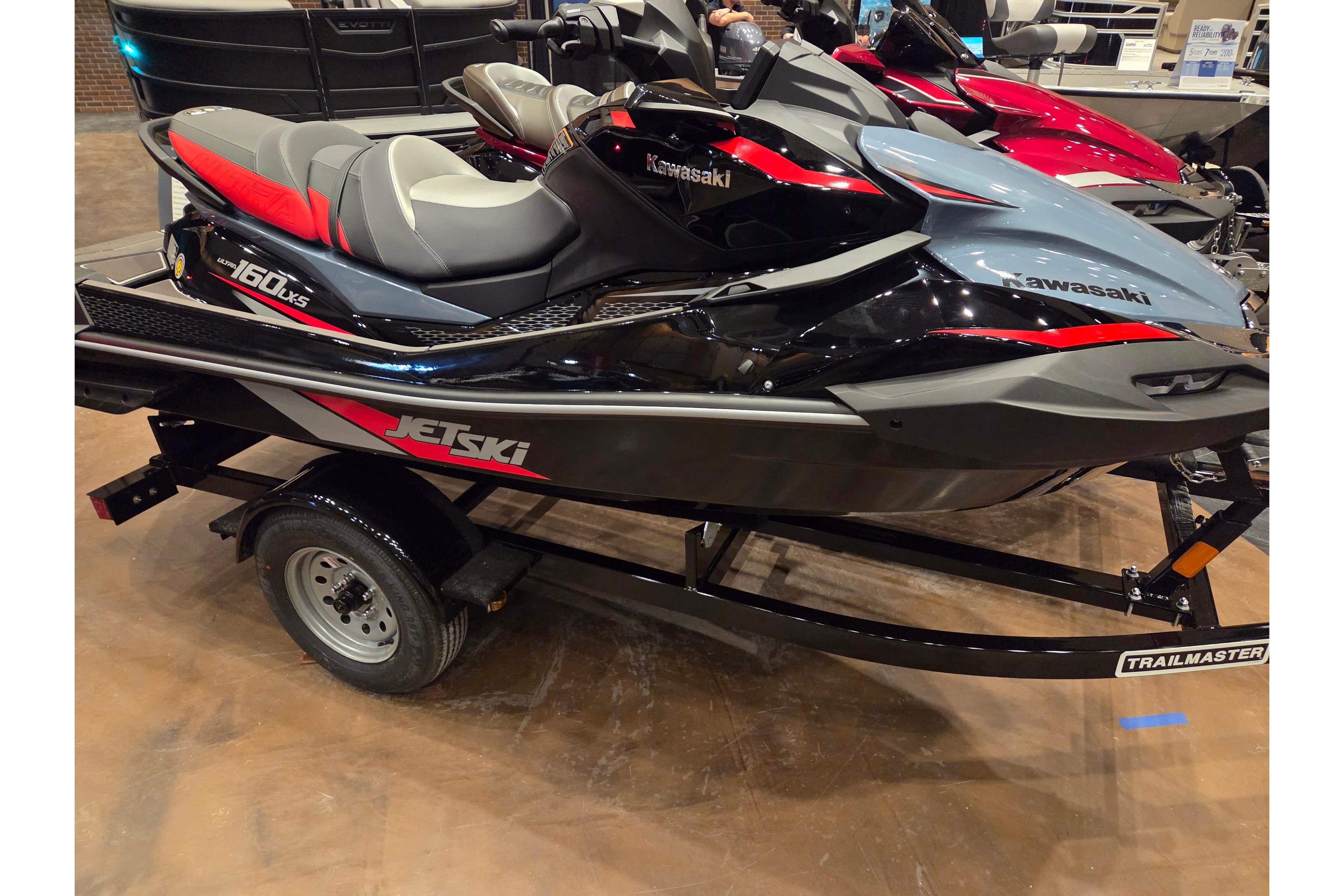 2026 Kawasaki ULTRA 160LX-S Jet Ski on display, featuring sleek design and vibrant colors.