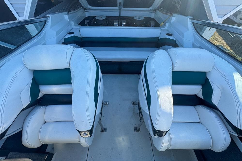1989 Formula 292 SR-1 boat interior with white and teal seating.