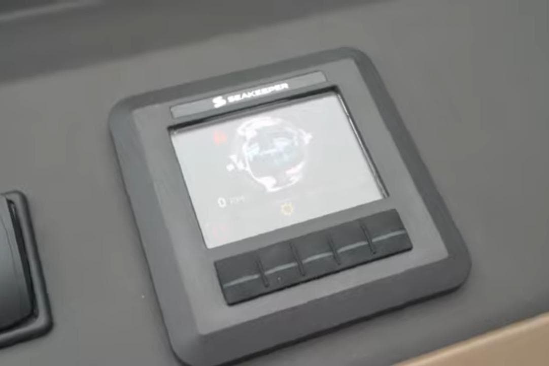 Seakeeper control panel on 2017 Azimut 66 yacht dashboard.