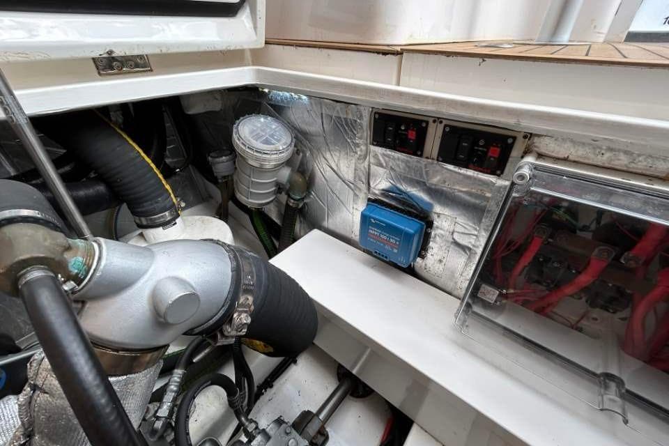 Engine compartment of 2019 Cockwells Duchy 35 boat, showing mechanical and electrical components.