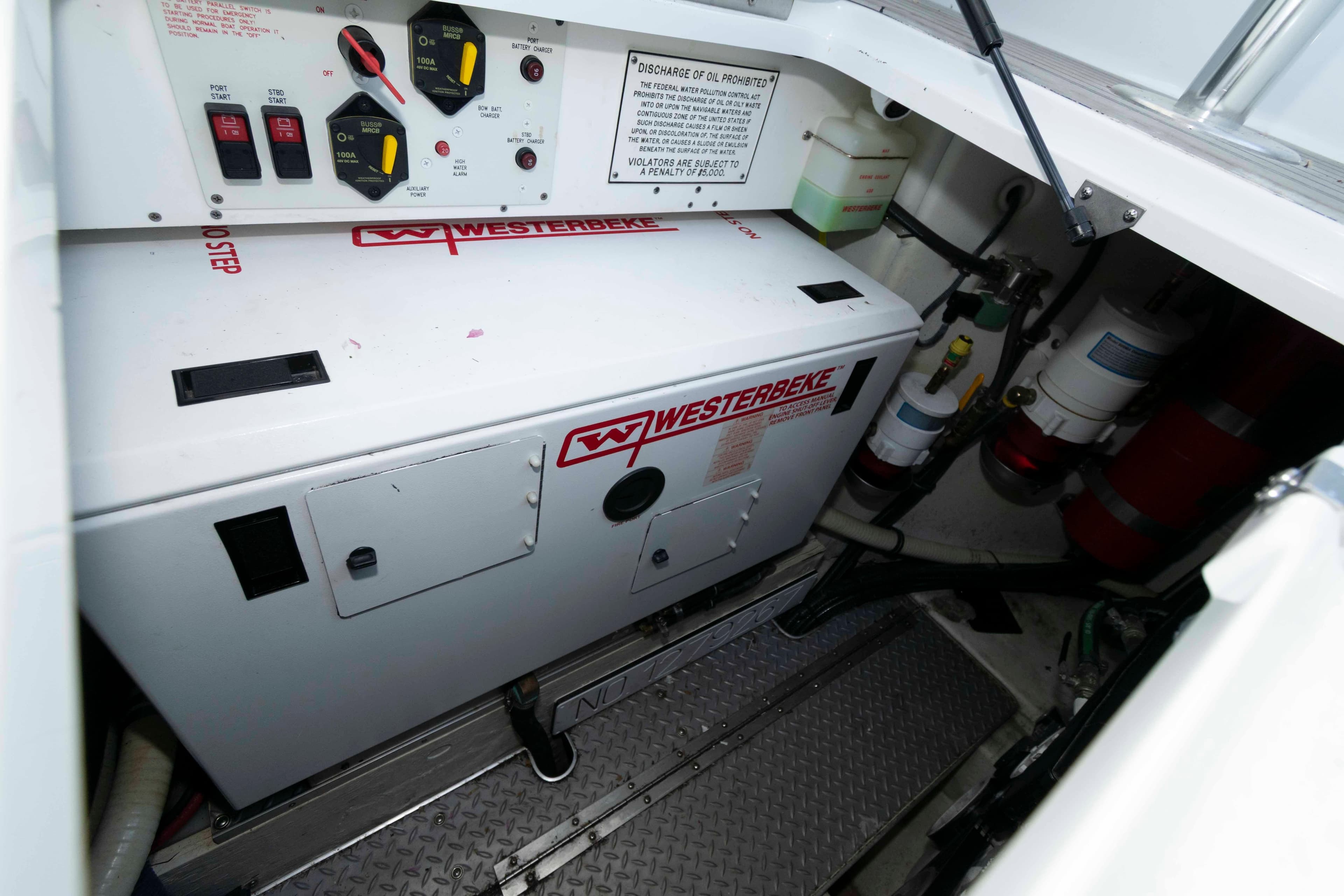 Engine compartment of 2011 Formula 37 Performance Cruiser with Westerbeke generator.