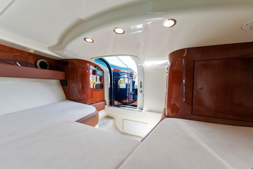 Interior cabin of 2020 Riva Aquariva Super luxury yacht with modern design and wooden finishes.