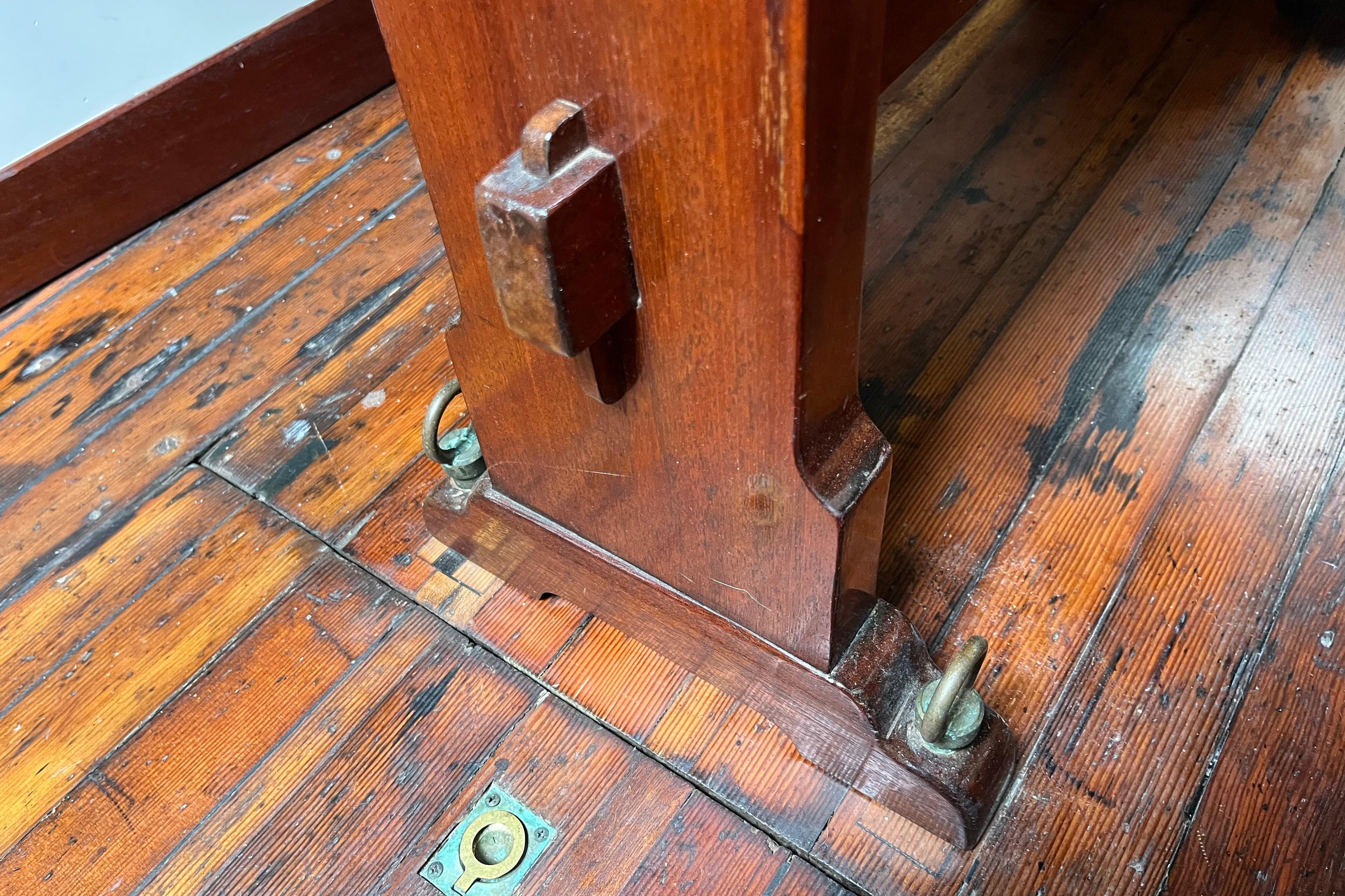 Wooden interior detail of a 1947 Murray Peterson Schooner, showcasing craftsmanship and vintage design.