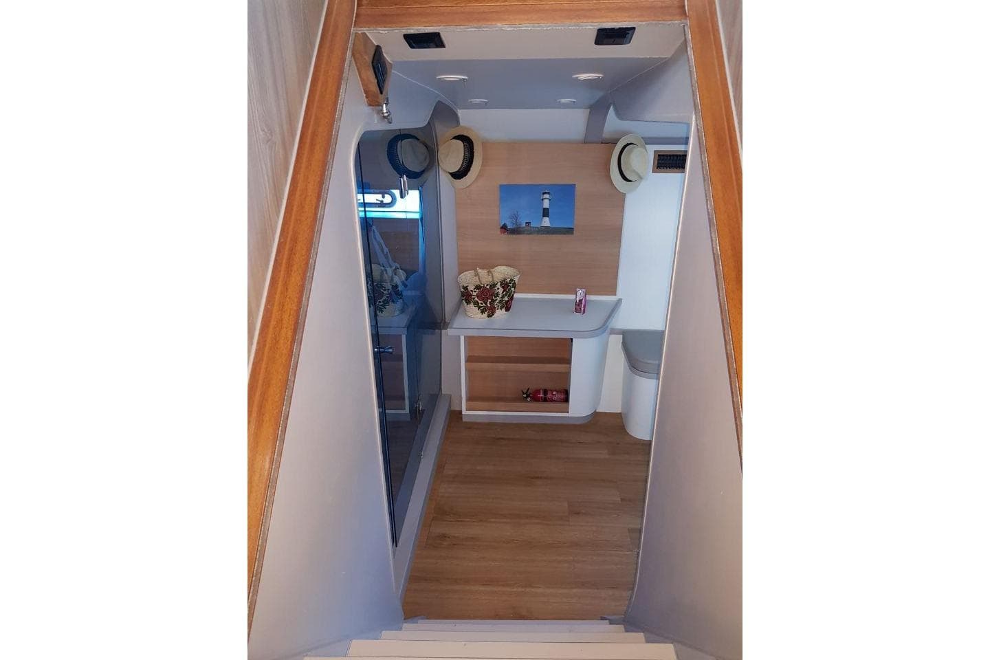 Interior of 2019 Squalt Marine CK 64 yacht with wooden flooring and decorative elements.