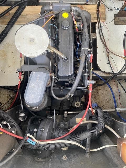 Engine compartment of a 1992 Jamestowner 16x72 houseboat, showing detailed mechanical components.