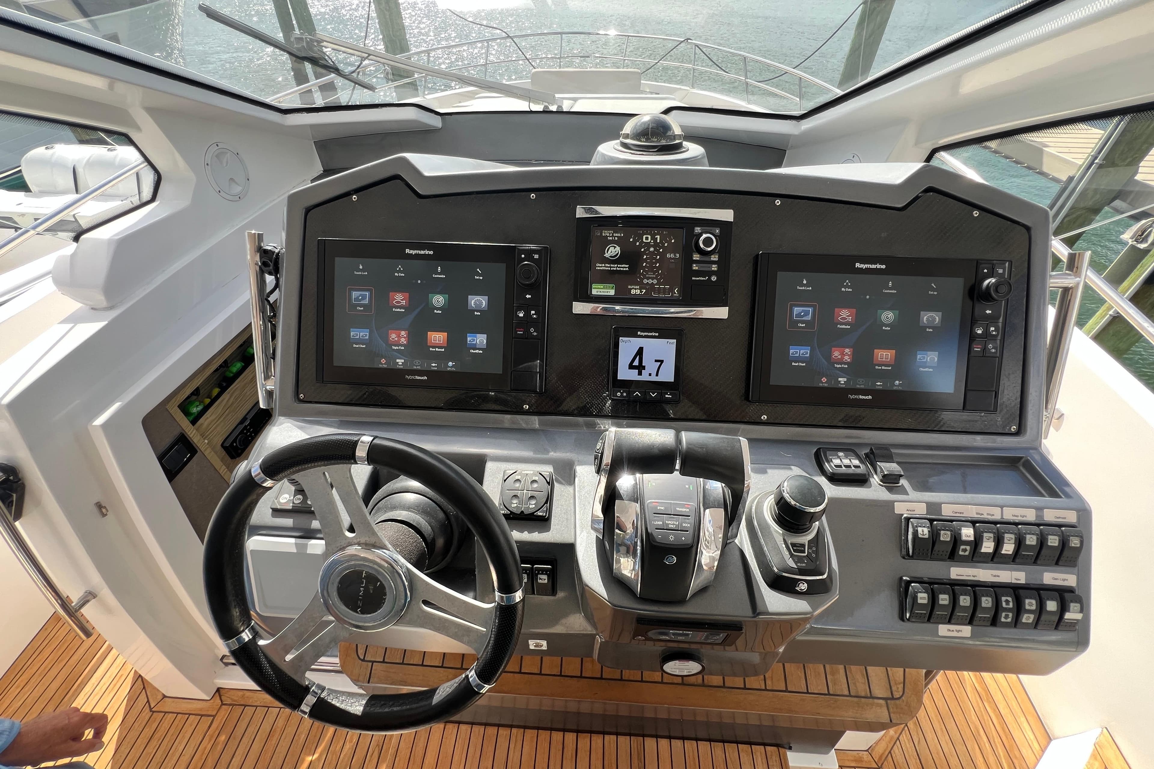 Cockpit of 2018 Azimut Verve 40 yacht with advanced navigation controls and dual displays.