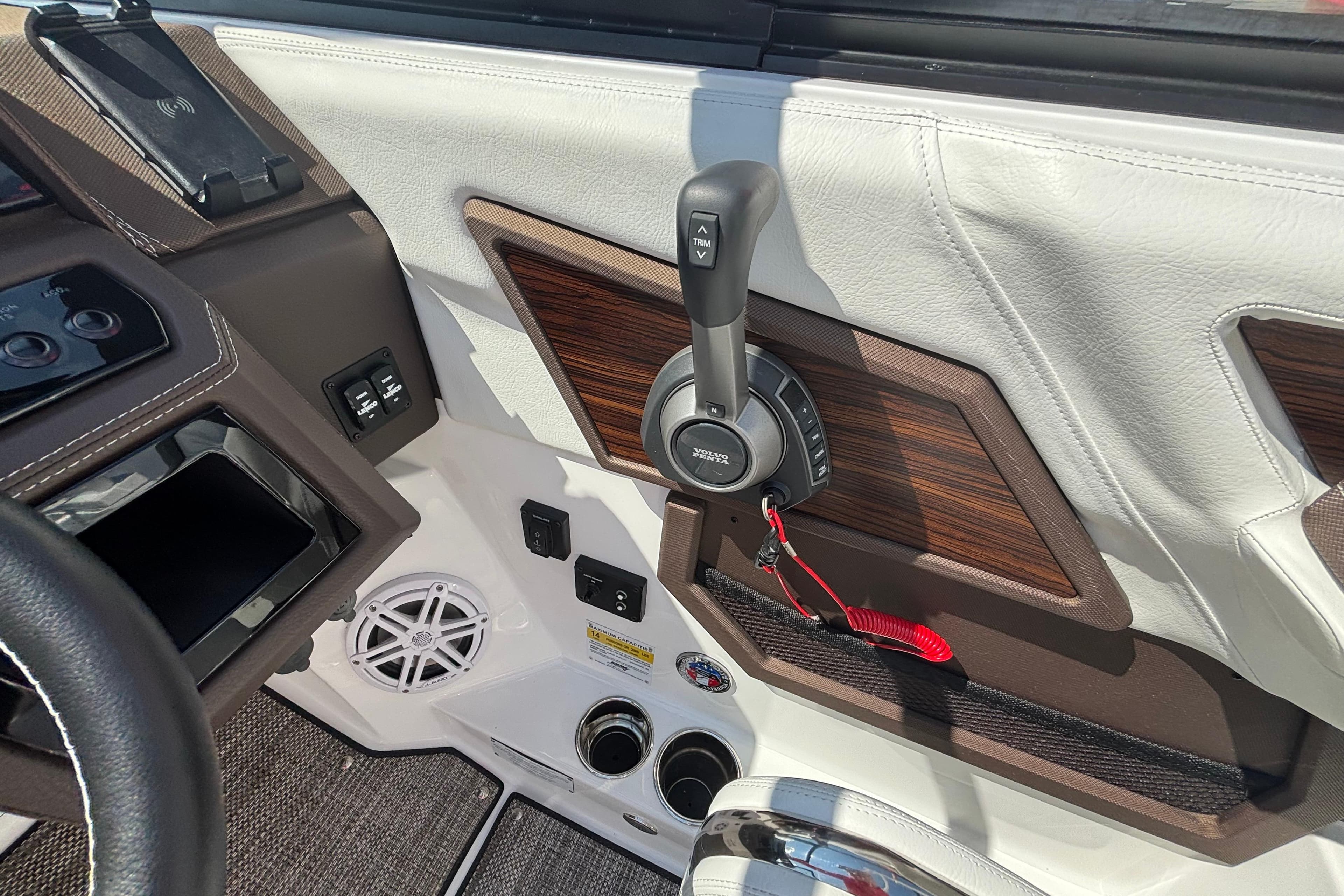 2025 Cobalt R6 Surf boat interior with control panel and throttle lever.