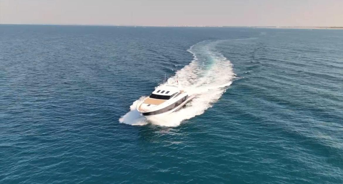 Luxury yacht Princess V78 cruising on open sea, 2011 model.