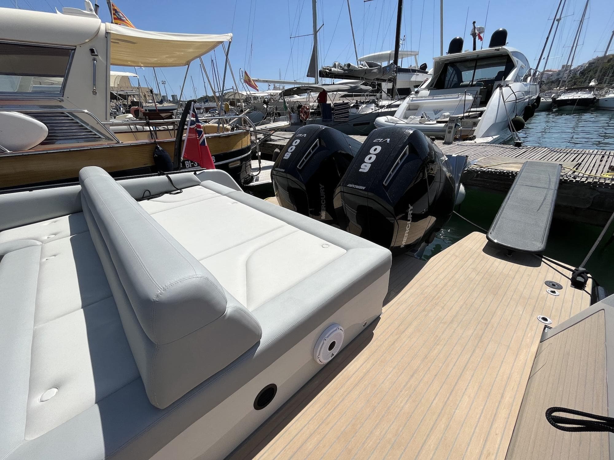 Luxury Chaser 54 Laguna yacht with twin engines docked at marina, 2023 model.