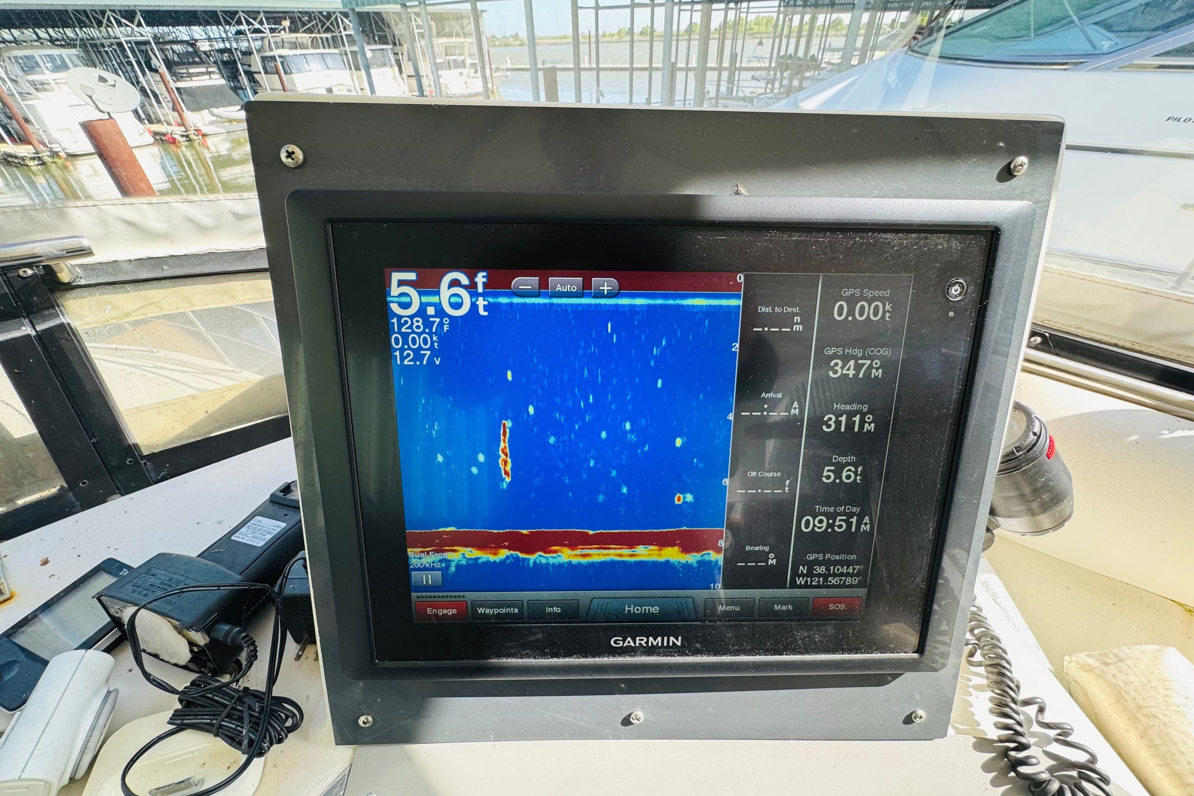 Garmin marine display on 1991 Californian 55 Cockpit Motor Yacht, showing sonar and navigation data.