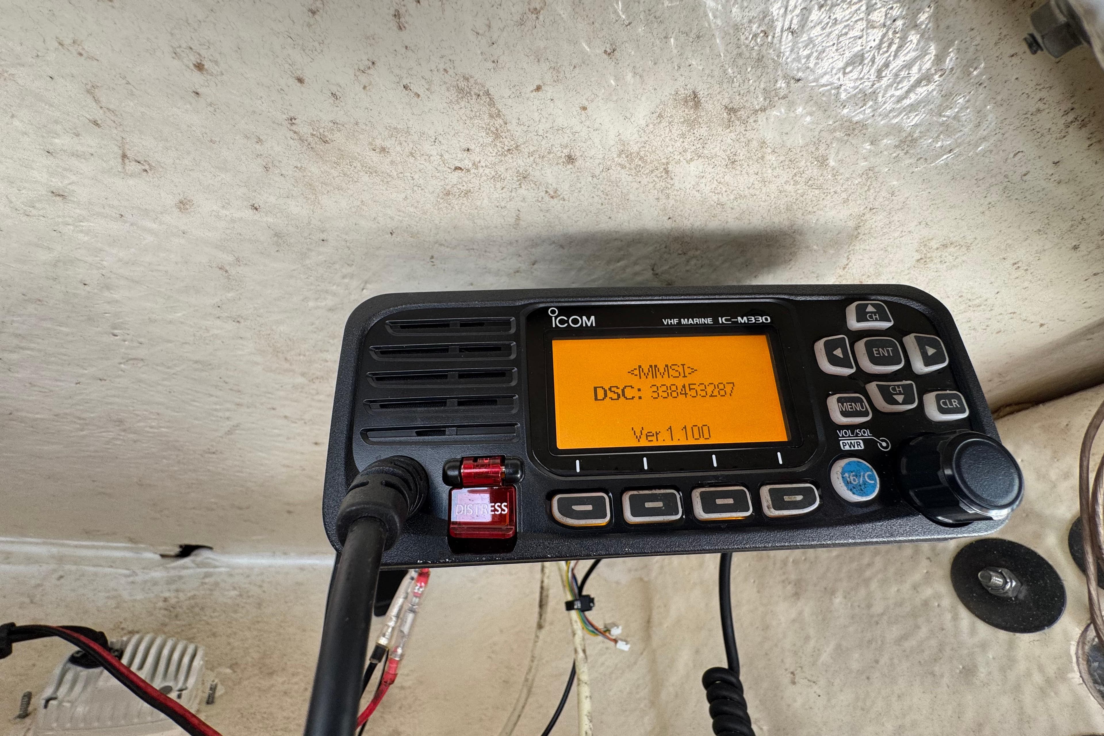 VHF marine radio on 2022 Key West 244 Center Console boat, displaying MMSI and DSC information.