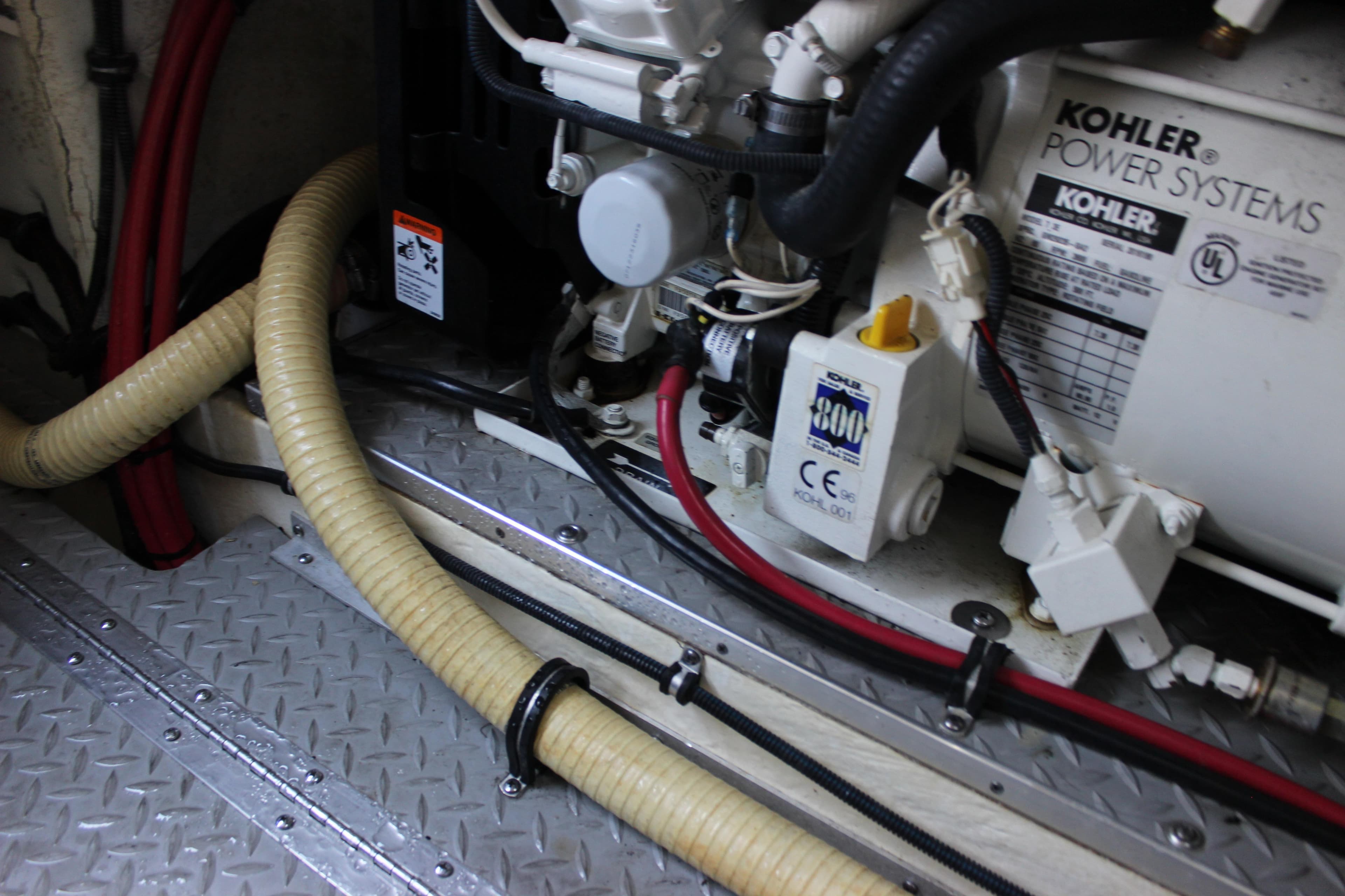 Engine compartment of a 2005 Formula 31 Performance Cruiser with Kohler power system.