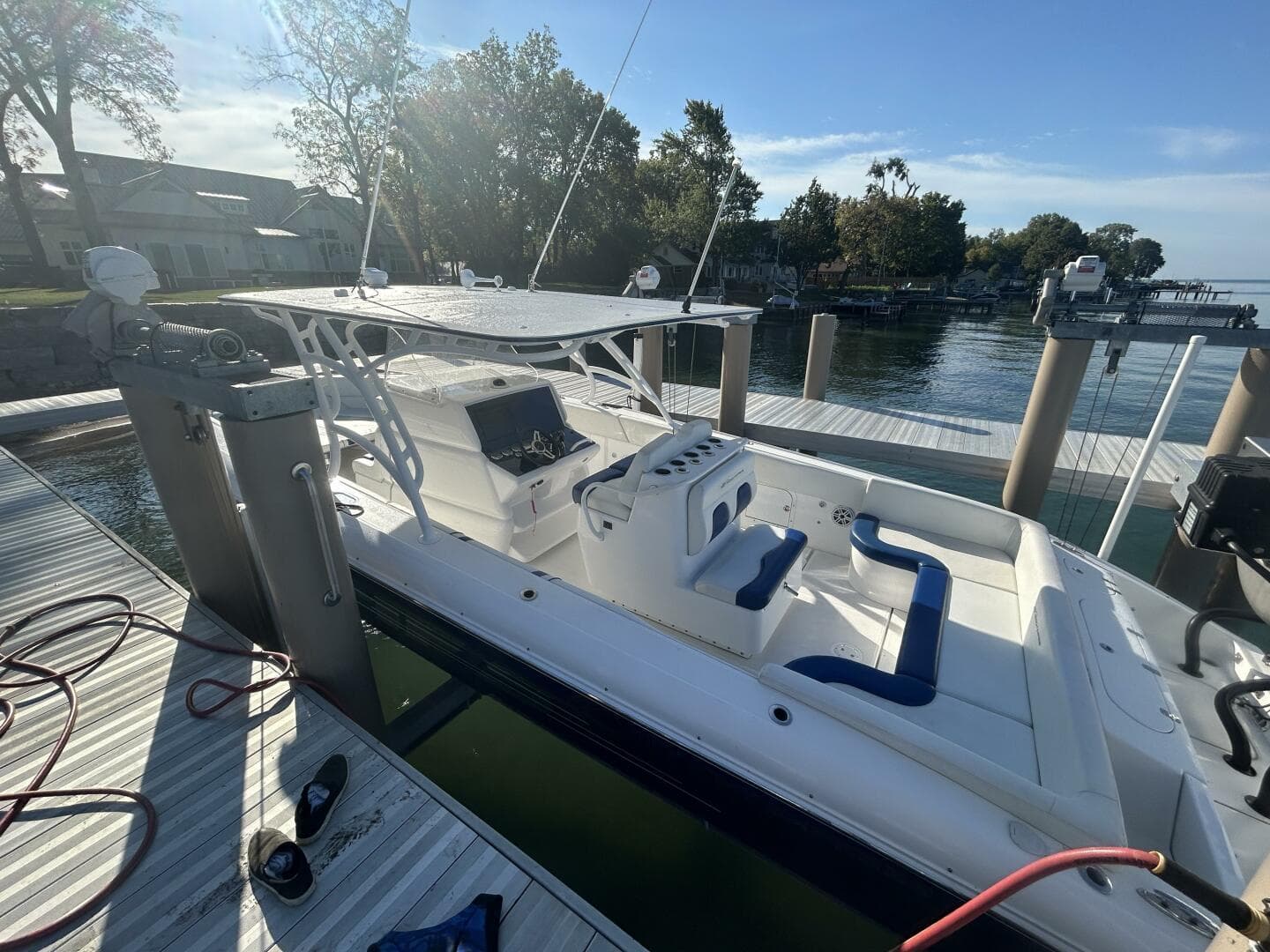 2016 Midnight Express 37 Open boat docked at marina, featuring sleek design and spacious seating.