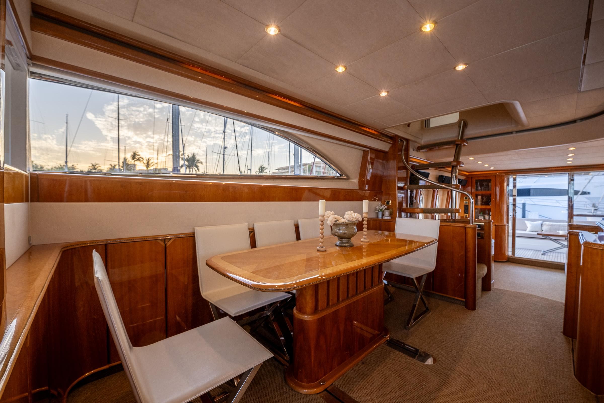 Luxurious interior of 2002 Viking Princess 72 SportCruiser yacht with elegant dining area.
