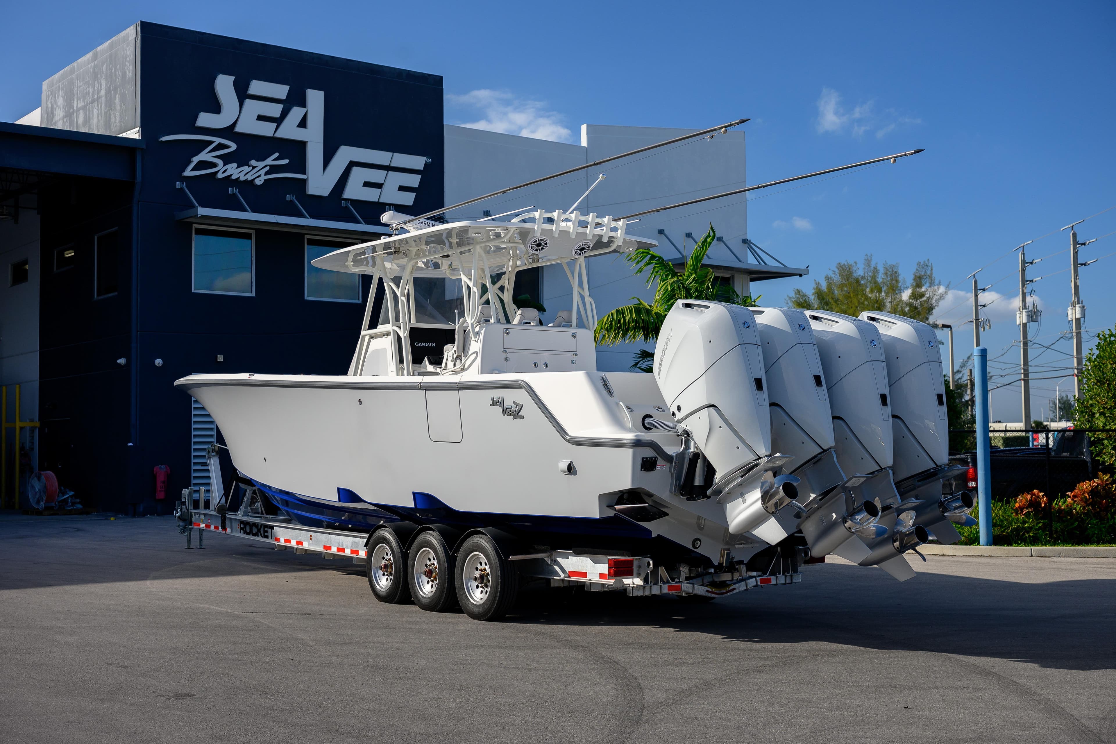 2025 SeaVee 400Z boat with multiple engines on a trailer outside SeaVee Boats facility.